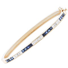 Sapphire And Diamond 18 Karat Yellow Gold Bangle Bracelet