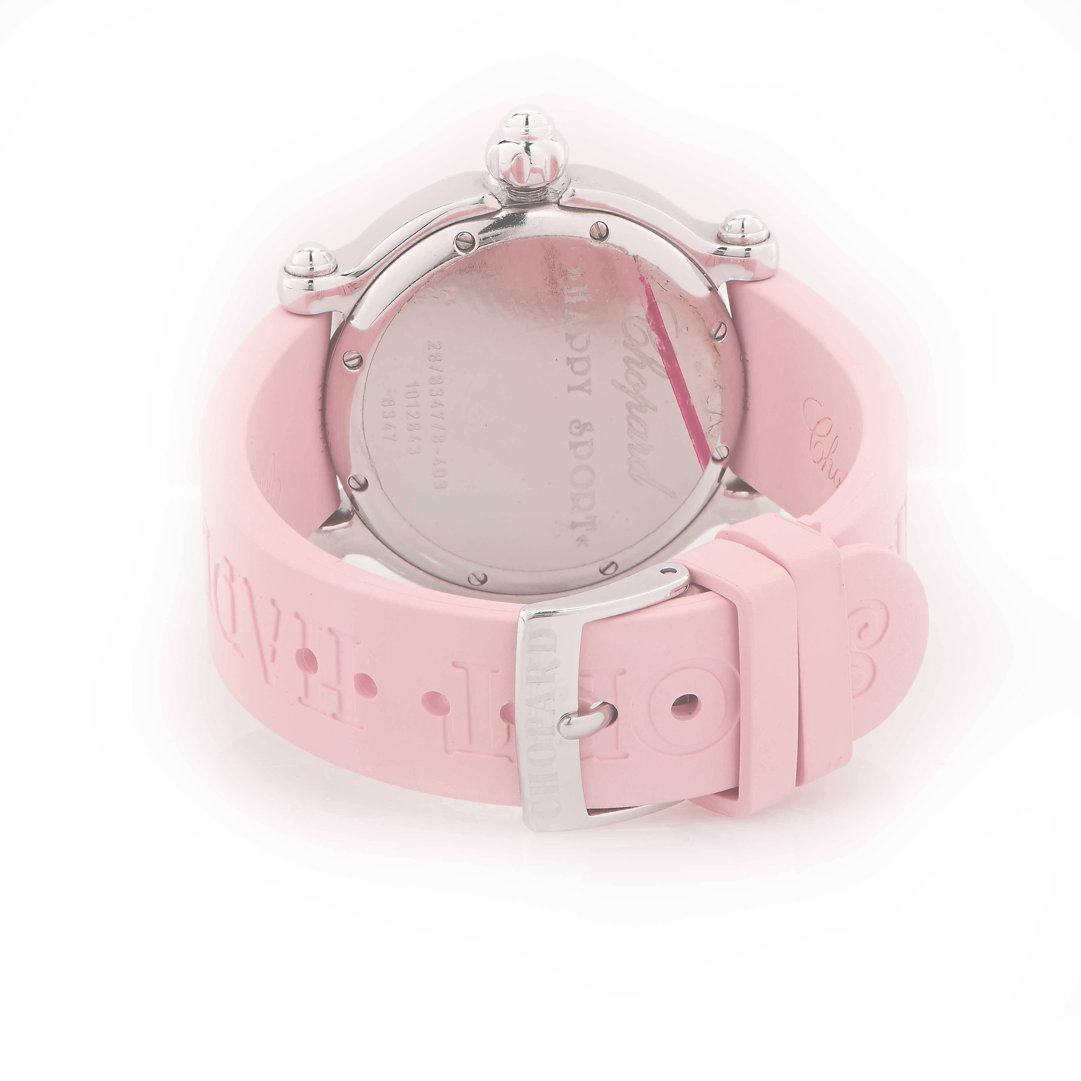 Orologio Chopard Happy Beach Pink Lady in acciaio inossidabile con due pesci galleggianti. I pesci galleggianti hanno zaffiri rosa e diamanti. Un pesce presenta 10 diamanti con un peso complessivo di  .12 carati e l'altro pesce presenta 10 zaffiri