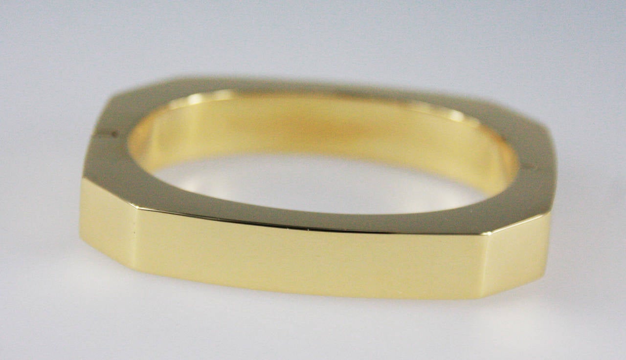 Bangle bracelet made in Italy. Internal circumference is 6.25 inches; With Italian factory stamp. 
Metal Type: 18 Karat Yellow Gold (tested and or stamped)
Weighs 37 grams