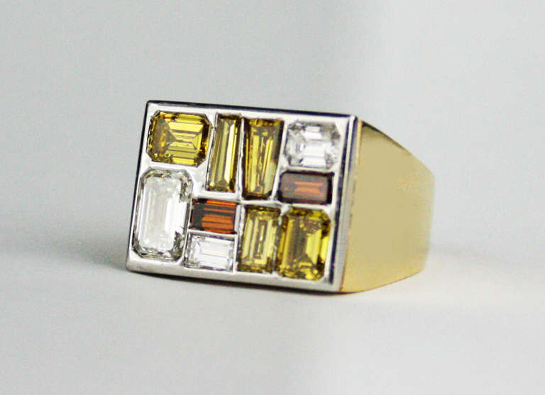 Diamond ring made in Germany set with 10 yellow, brown and white diamonds, weighing approximately 3.10 carats. 


Ring is size 5 1/2 and can be sized.
Metal Type: 18 Karat Yellow Gold (tested and/or stamped)
The yellow and brown diamonds have not