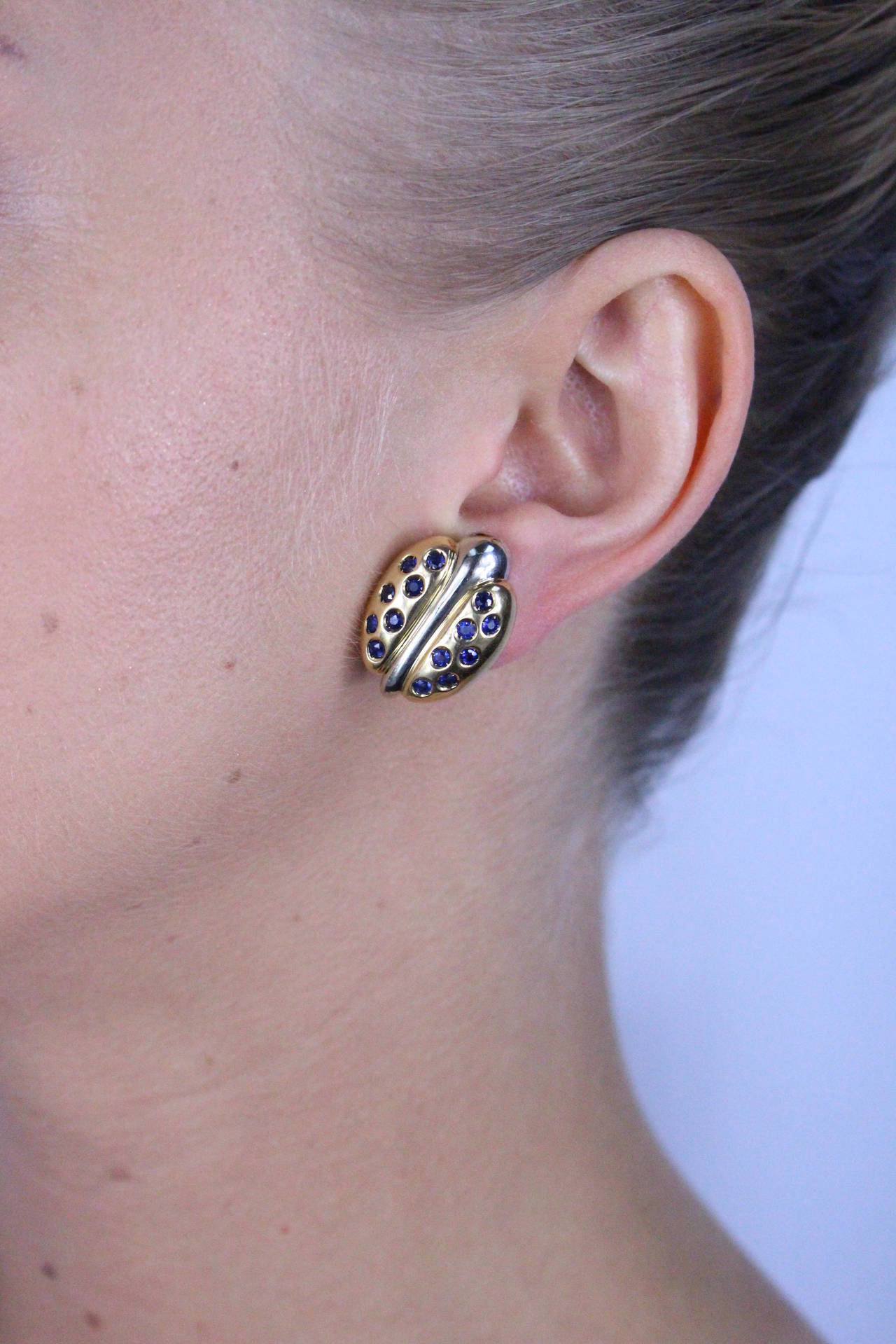 Faraone Lady Bug ear clips set with 28 round sapphires weighing approximately 1.40 carats. With Faraone and Italian stamps.

Metal Type: 18Kt Yellow Gold
Metal Weight: 14.8 Grams