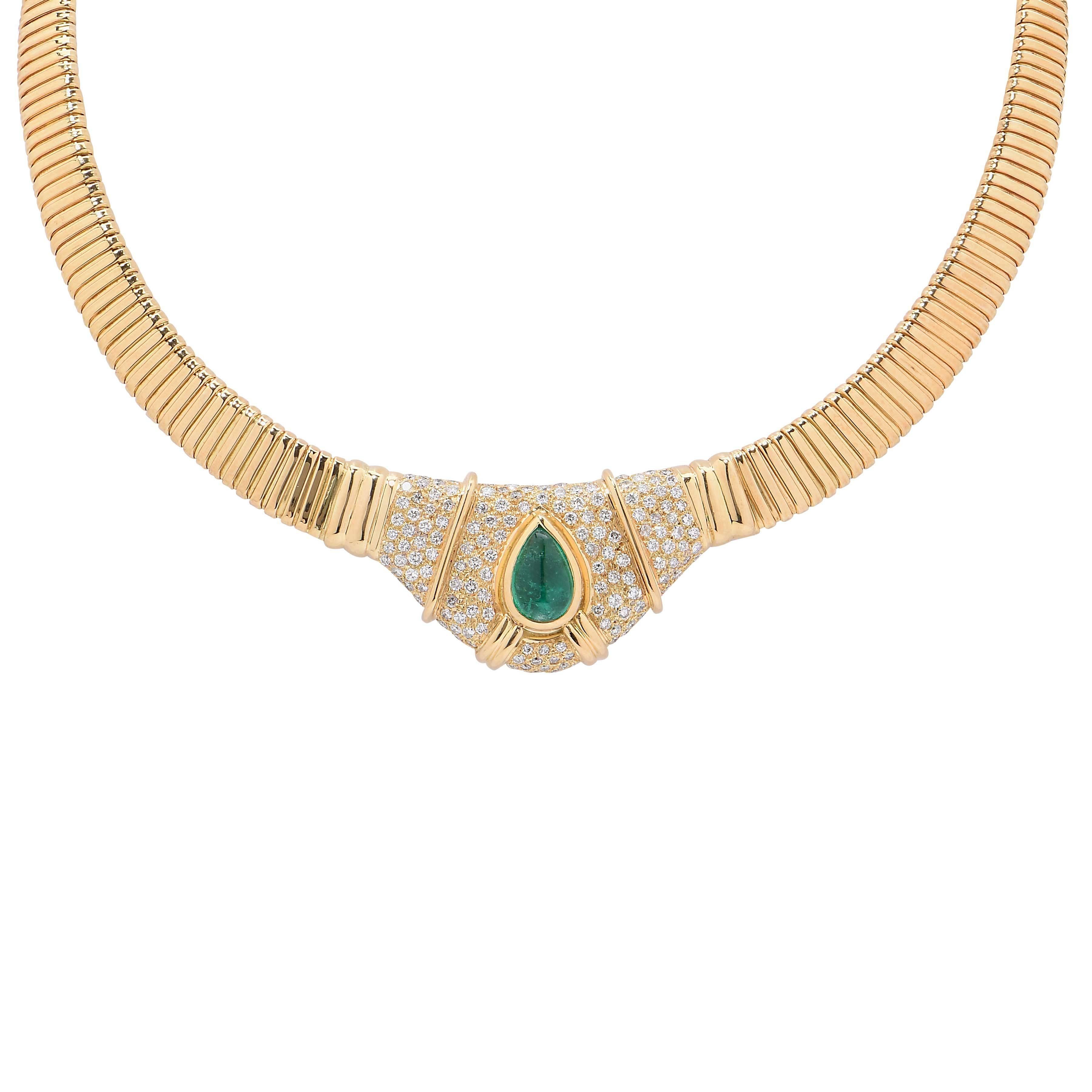Tubogas necklace with 140 diamonds weighing approximately 2.10 carats, and one cabochon emerald drop weighing approximately 3 carats. Circa 1980

Metal Type: 18 Carat