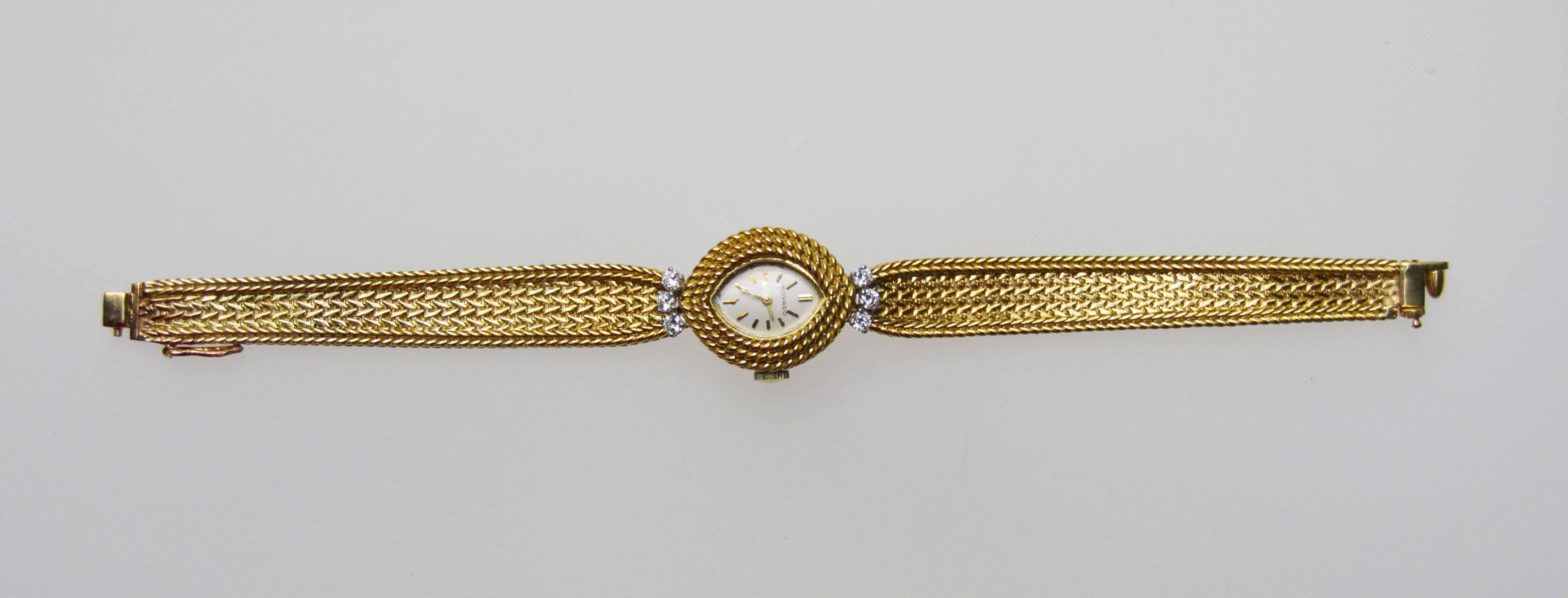 Ladies watch with the bracelet and case made in France, and a mechanical movement made by Movado. Accented by 6 round diamonds. 
Was serviced, and is in running condition. 