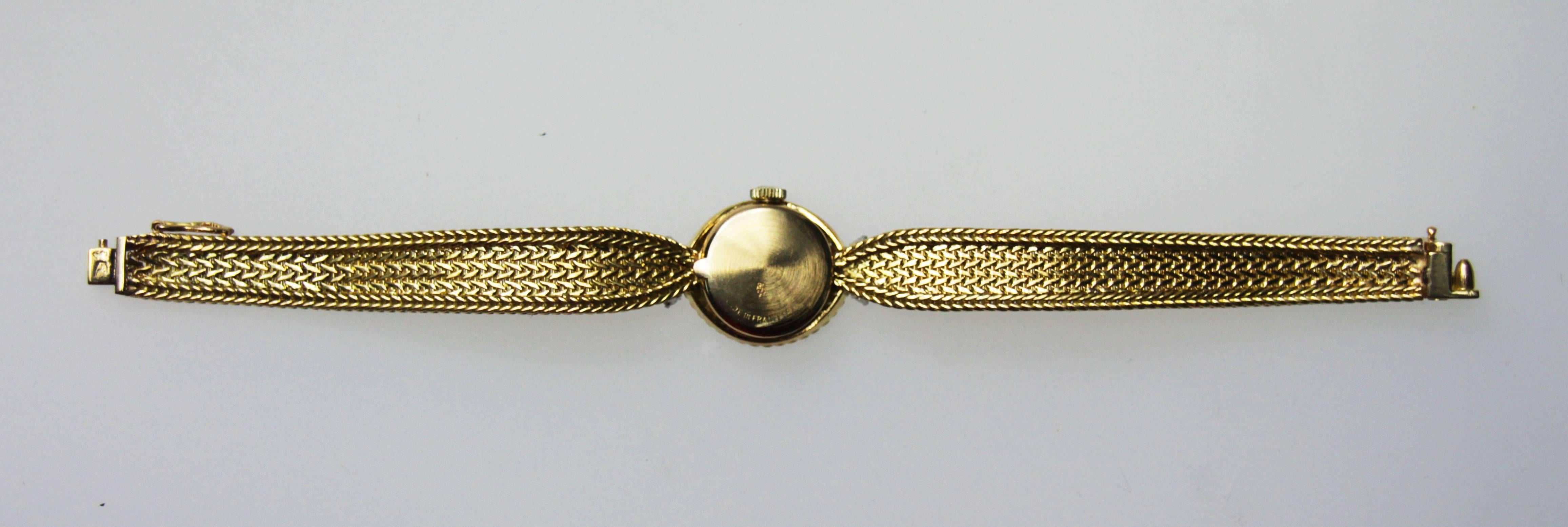 Taille ronde Montre-bracelet Movado à mouvement en or jaune et diamants pour dame en vente