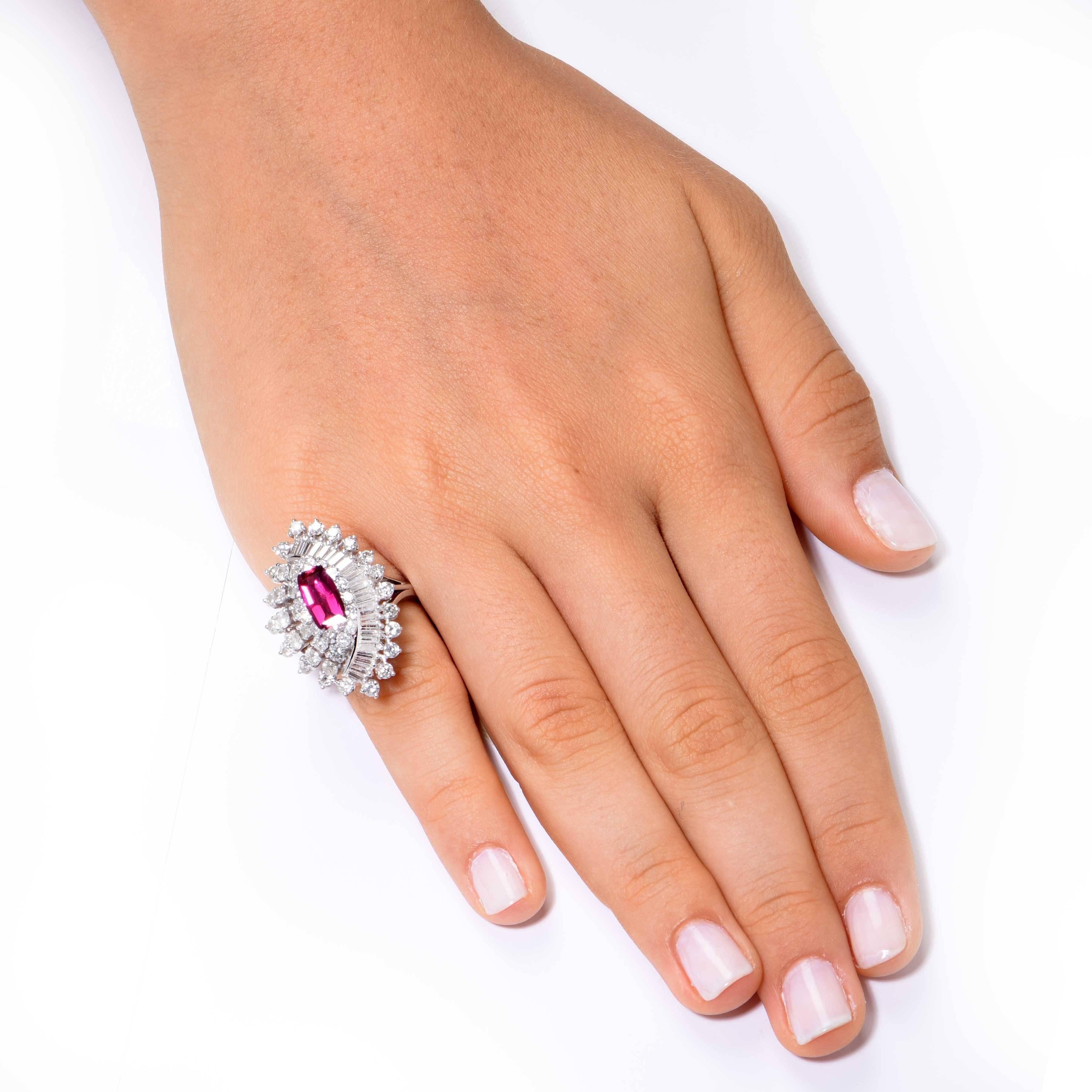 Natural Red Spinel and diamond ring featuring 48 round and baguette diamonds weighing approximately 3 carats.  

Ring size is 5 1/2. Can be sized-no charge. 
Metal Type: 14 Kt White Gold (stamped and/or tested)
Metal Weight: 11.4 Grams