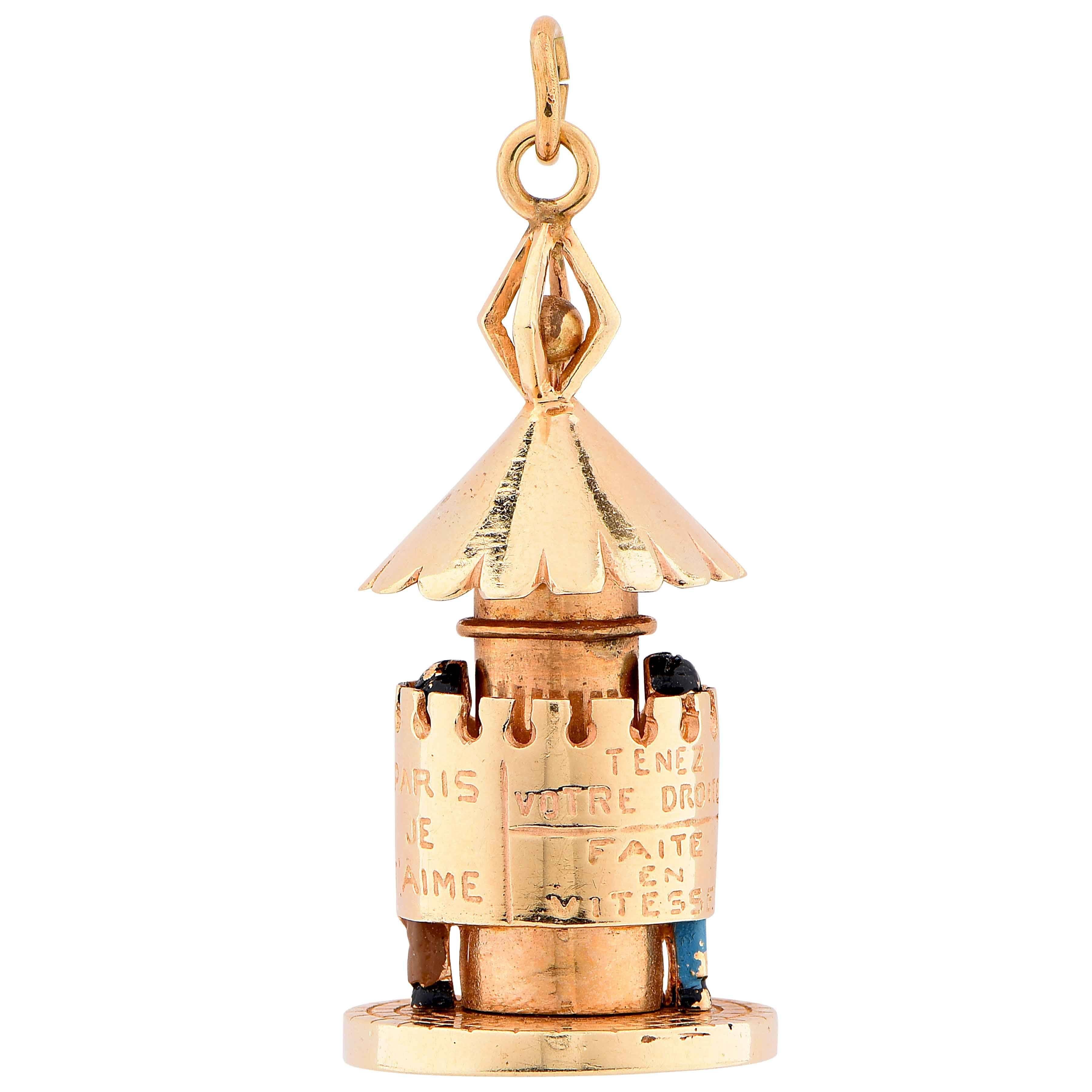 Whimsical pendant with central section that rotates, depicting a classic French street urinal. Etched statements in French on rotating wall. Can be an Objet d'Art.