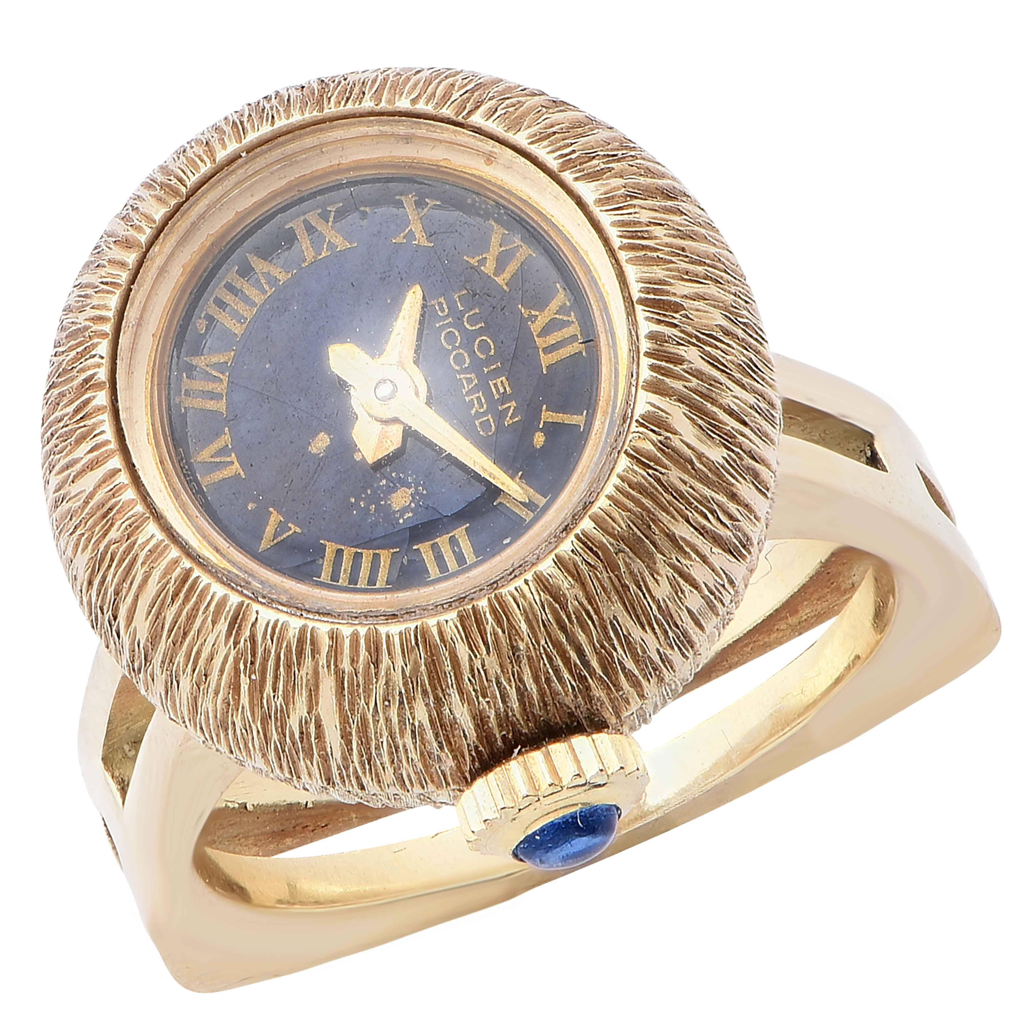 Lucien Picard lady's 14k yellow gold ring watch with manual-wind movement in a brushed gold case. The blue enamel dial has small losses (visible in the picture).

Ring size 5 1/2
Metal Type: 14Kt Yellow Gold
Metal Weight: 11.8 Grams
