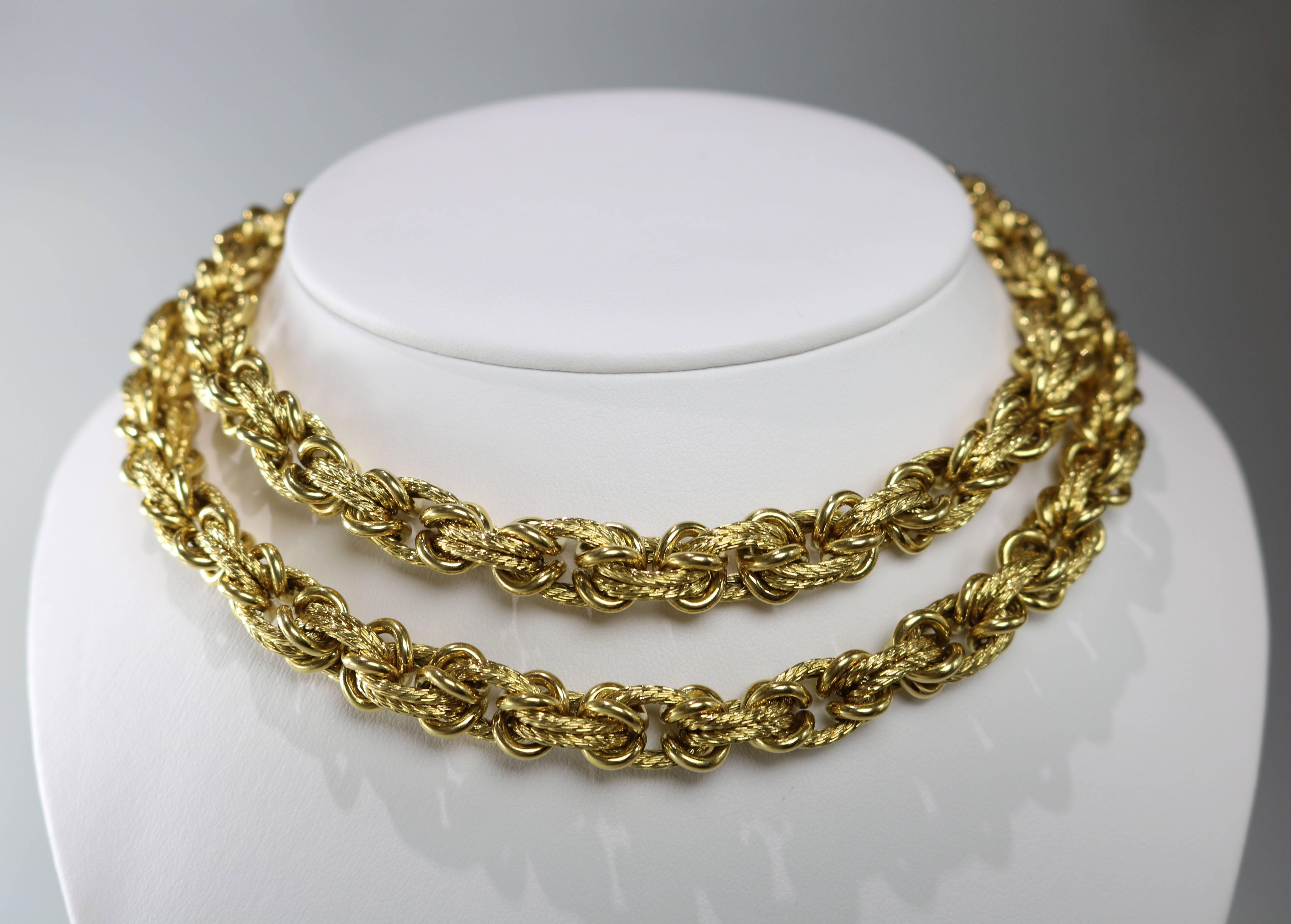 Desirable 30 inch long Van Cleef & Arpels gold chain necklace from the 1970's. 
A combination of high polish and woven rope links result in a classic look. 
The necklace is stamped VCA, a serial number, a European  hallmark and 18K gold. It is