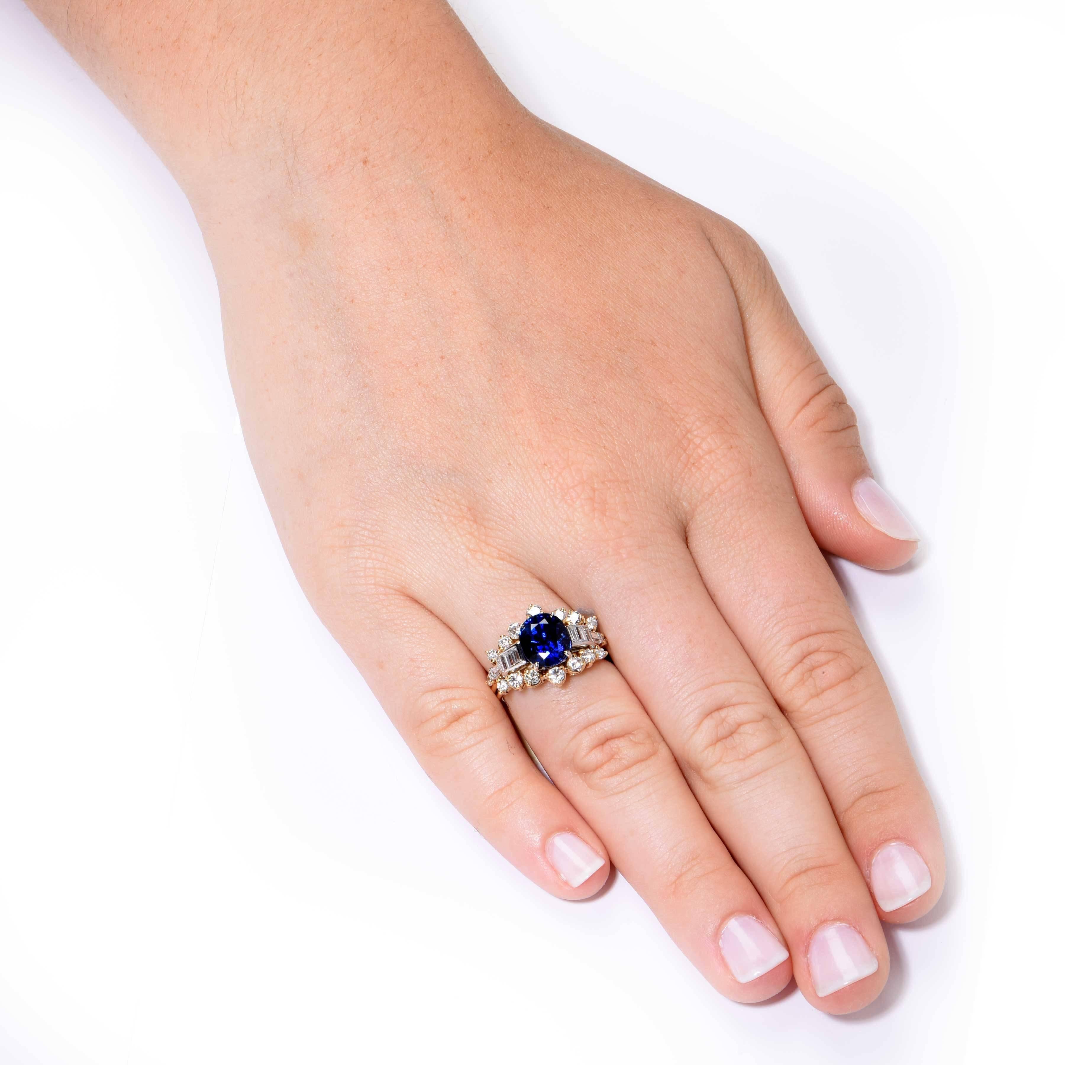 This beautiful ring is set with a natural oval sapphire weighing 3.35 carats, surrounded by round and baguette diamonds weighing 1.27 carats. 

Size 6 1/2 (Can be sized at no charge)
Metal Type: 18 Kt Yellow Gold (Stamped and/or tested)
Metal
