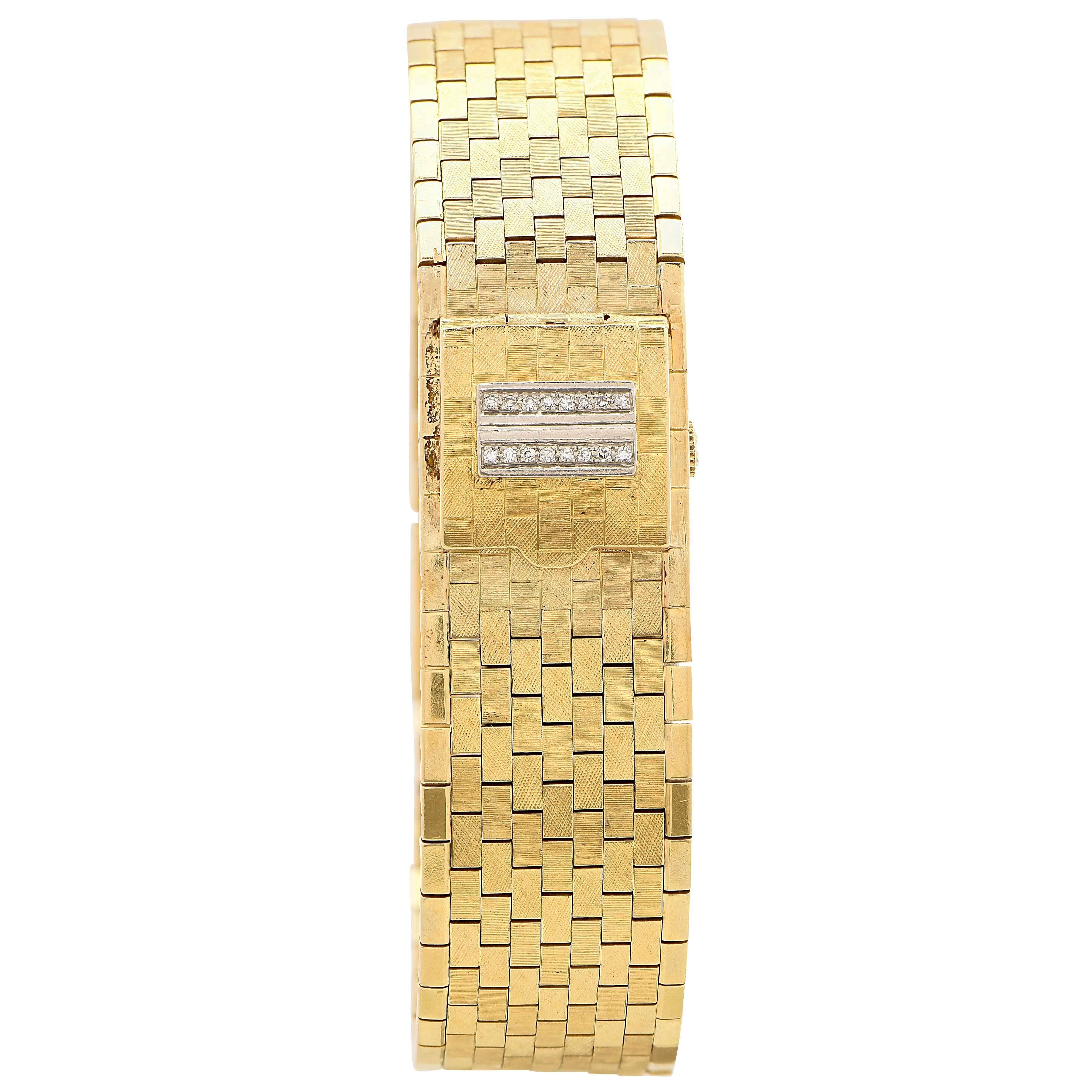 Lady's Rolex 18 Karat Yellow Gold Watch. 
This interesting watch features 16 single cut diamonds with an estimated total weight of .08 carats on its cover.
Metal: 18 Karat Yellow Gold Tested
Metal Weight: 61.8 grams