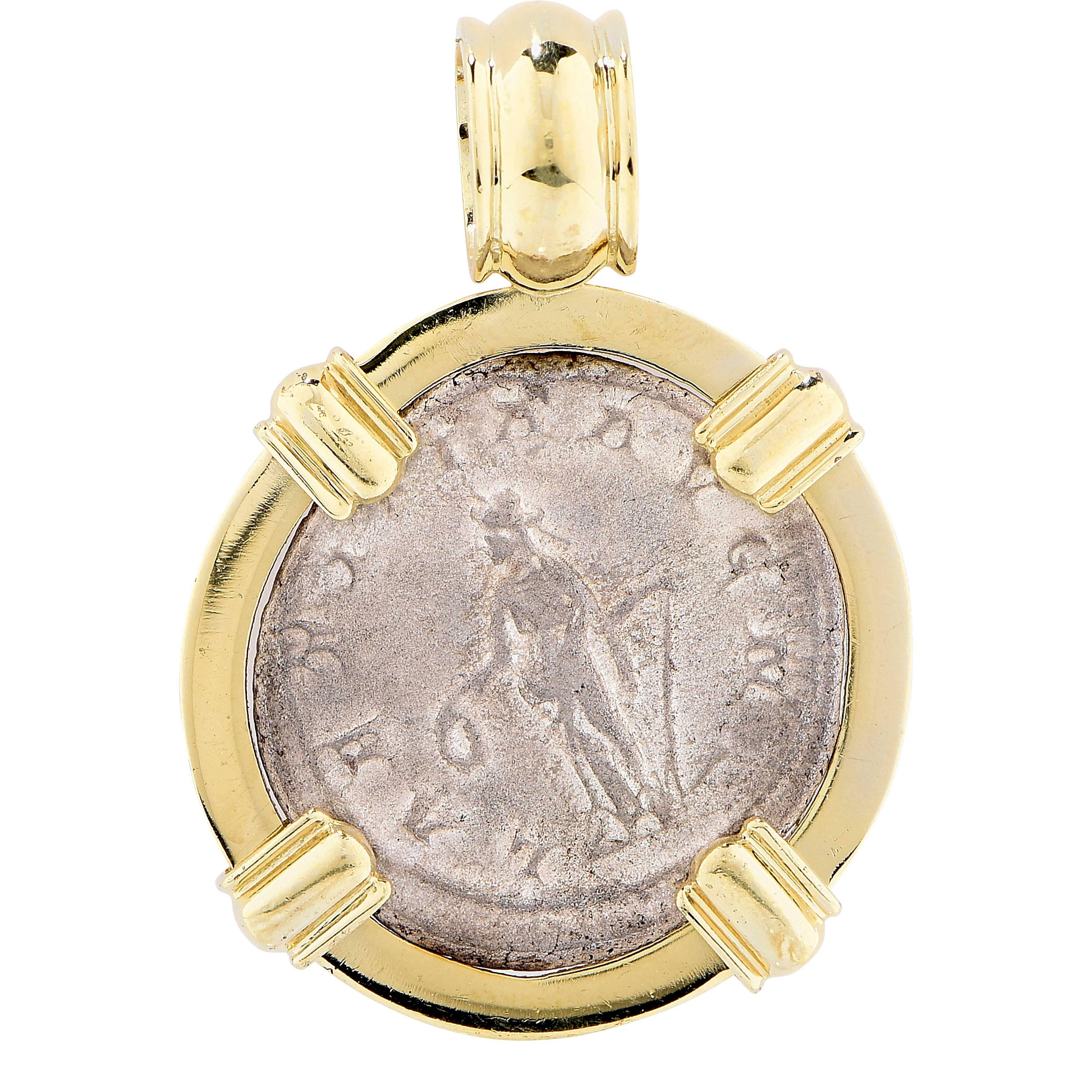 Greek Coin Pendant with Emeralds and Diamonds

Metal Weight: 12.36 Grams