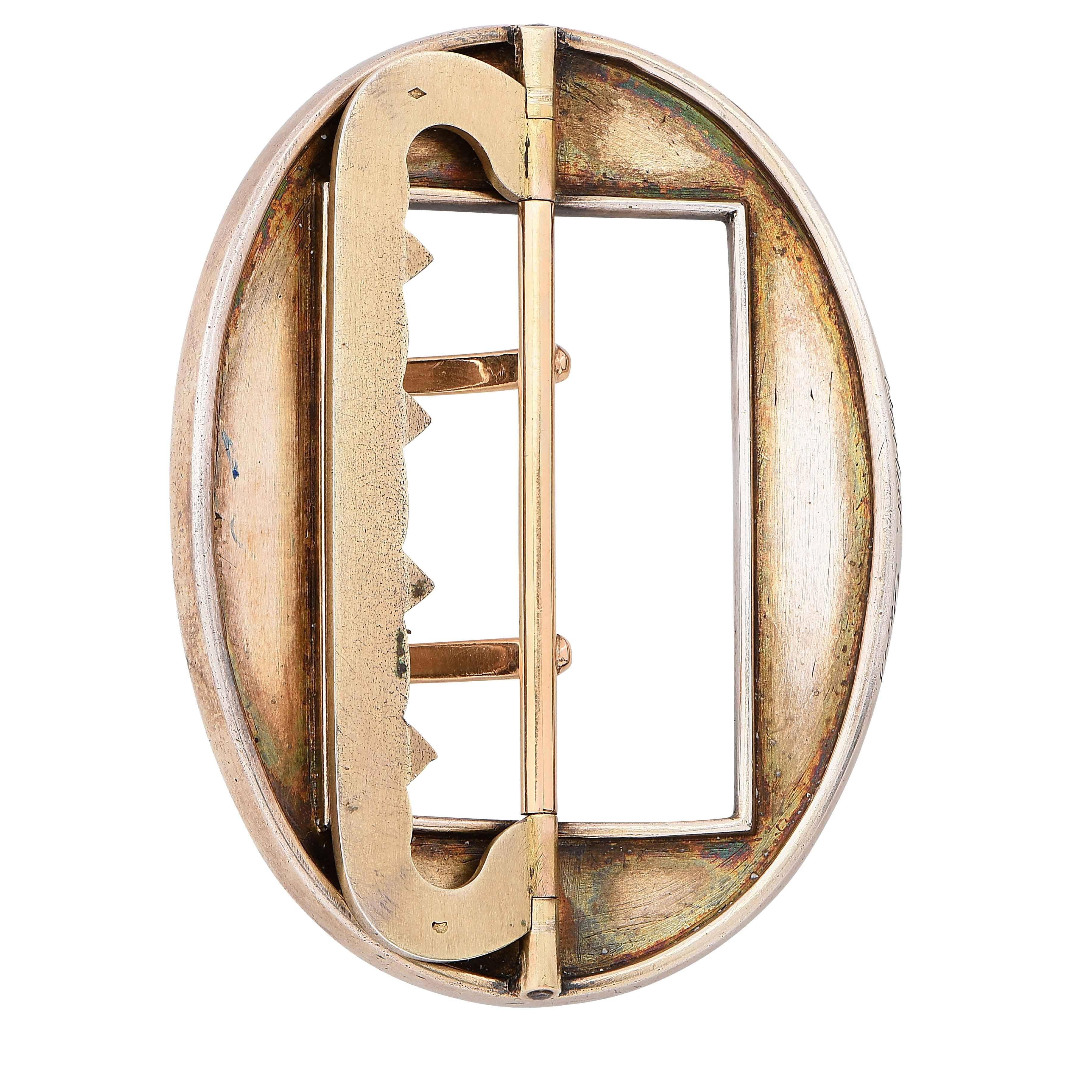 This wonderful enamel buckle by Cartier, Paris features meticulous attention to detail in its very fine enamel work.
Dating from around 1890 this 18 karat yellow and rose gold beauty is from the Anne R Lichtblau Collection and is numbered