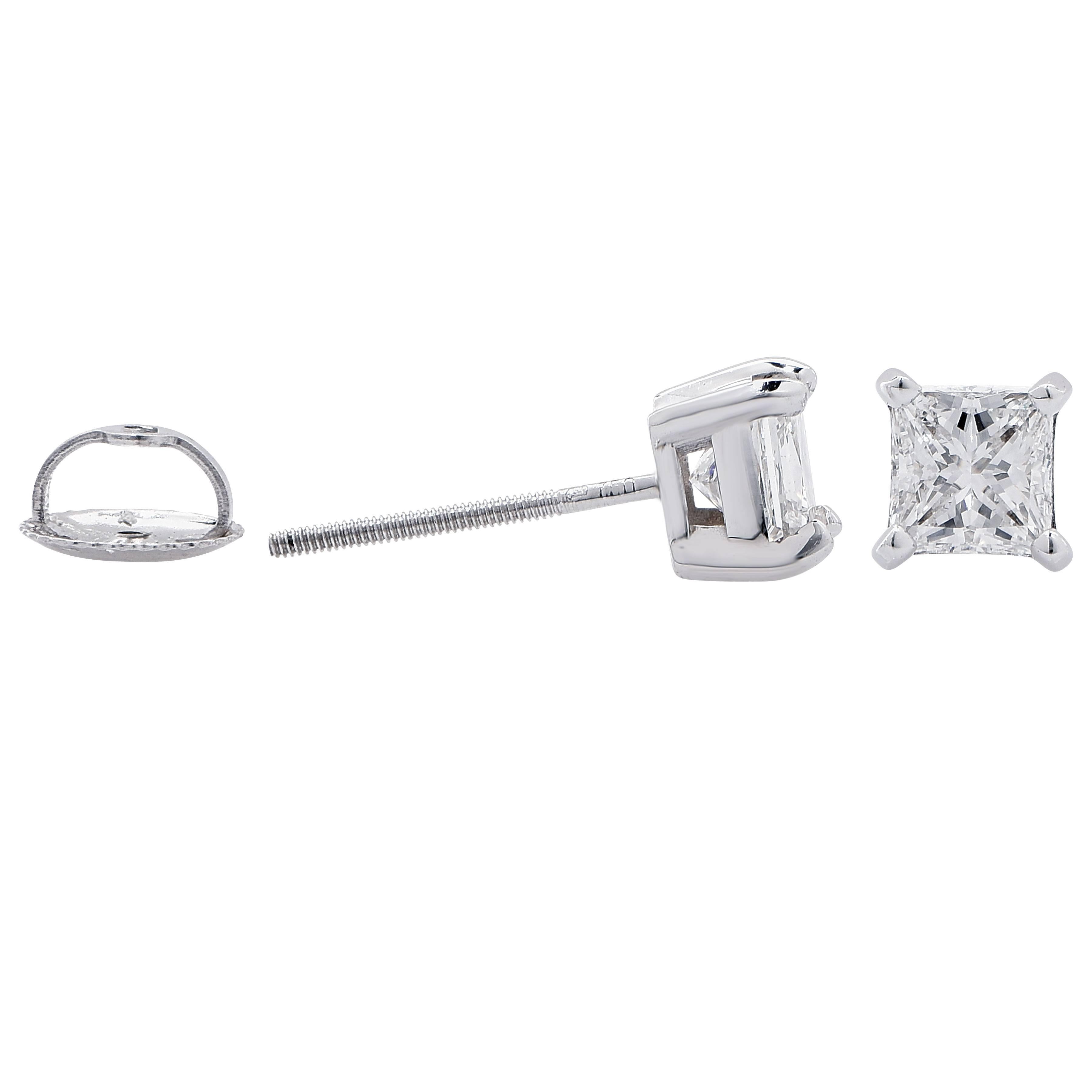 Modern 1.17 Carat Total weight Princess Cut Earrings E Color, VS1 Clarity set in 18 Karat White Gold.

Metal Type: 18 Kt White Gold (tested and/or stamped)
Metal Weight: 1.5 Grams