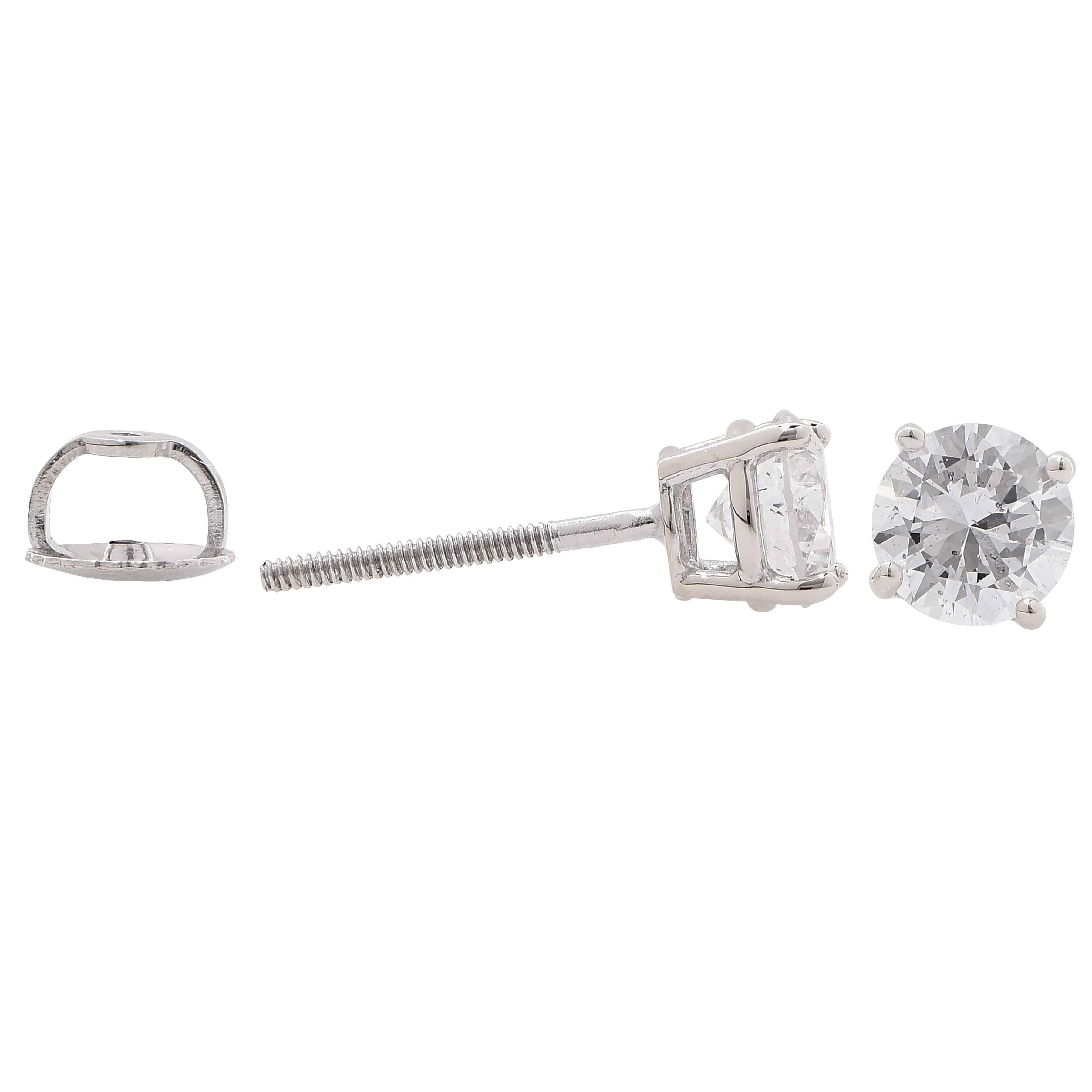 1.2 Carat total weight diamond stud earrings featuring two round brilliant cut diamonds with a total weight of 1.2 carats averaging E color and SI Clarity set in 18 karat white gold.

Metal Type: 18 Carat White Gold Stamped
Metal Weight: 2.5 Grams
