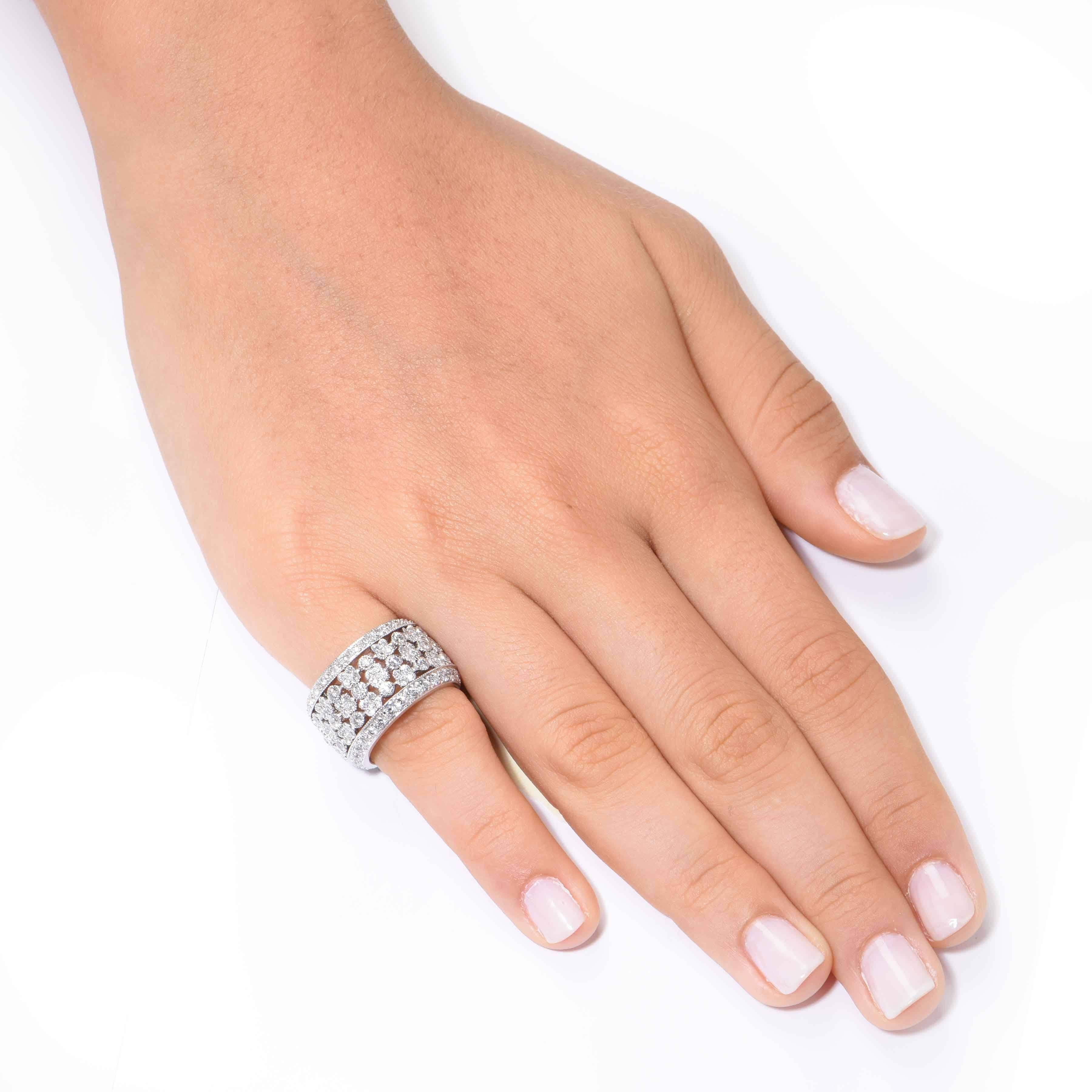 3.11 Carat Diamond Five Row Platinum Band featuring 206 round cut diamonds with a total weight of 3.11 carats. H/I Color SI1 Clarity.

Ring Size: 6 (cannot be sized)
Metal Type: Platinum (tested and/or stamped)
Metal Weight: 16.3 Grams