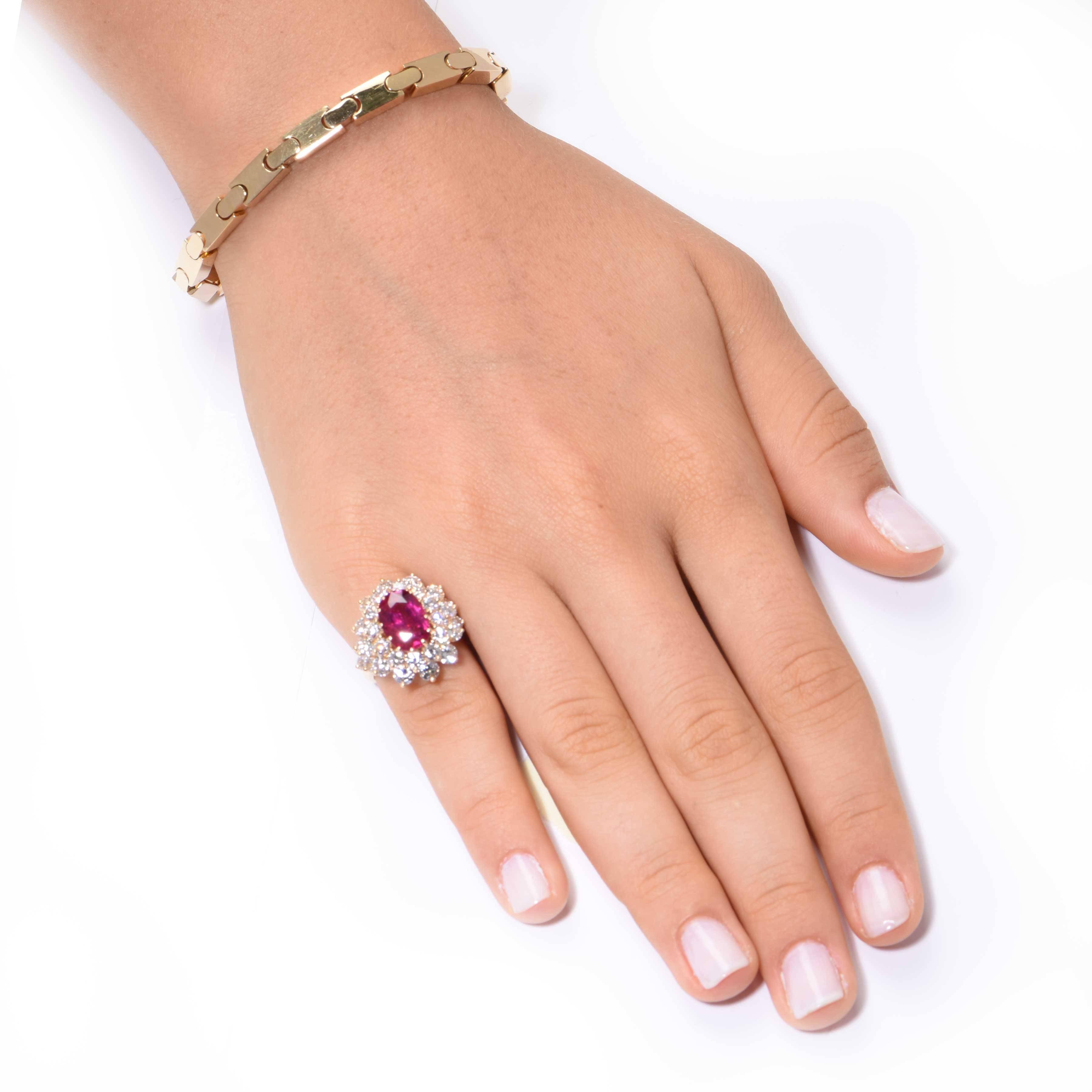 This ruby and diamond ring features a 3.70 carats no heat Burmese oval ruby, surrounded by round diamonds weighing approximately 2.70 carats. Comes with AGL report stating that the ruby is of Burmese origin, with no indications of heating.
Size 4