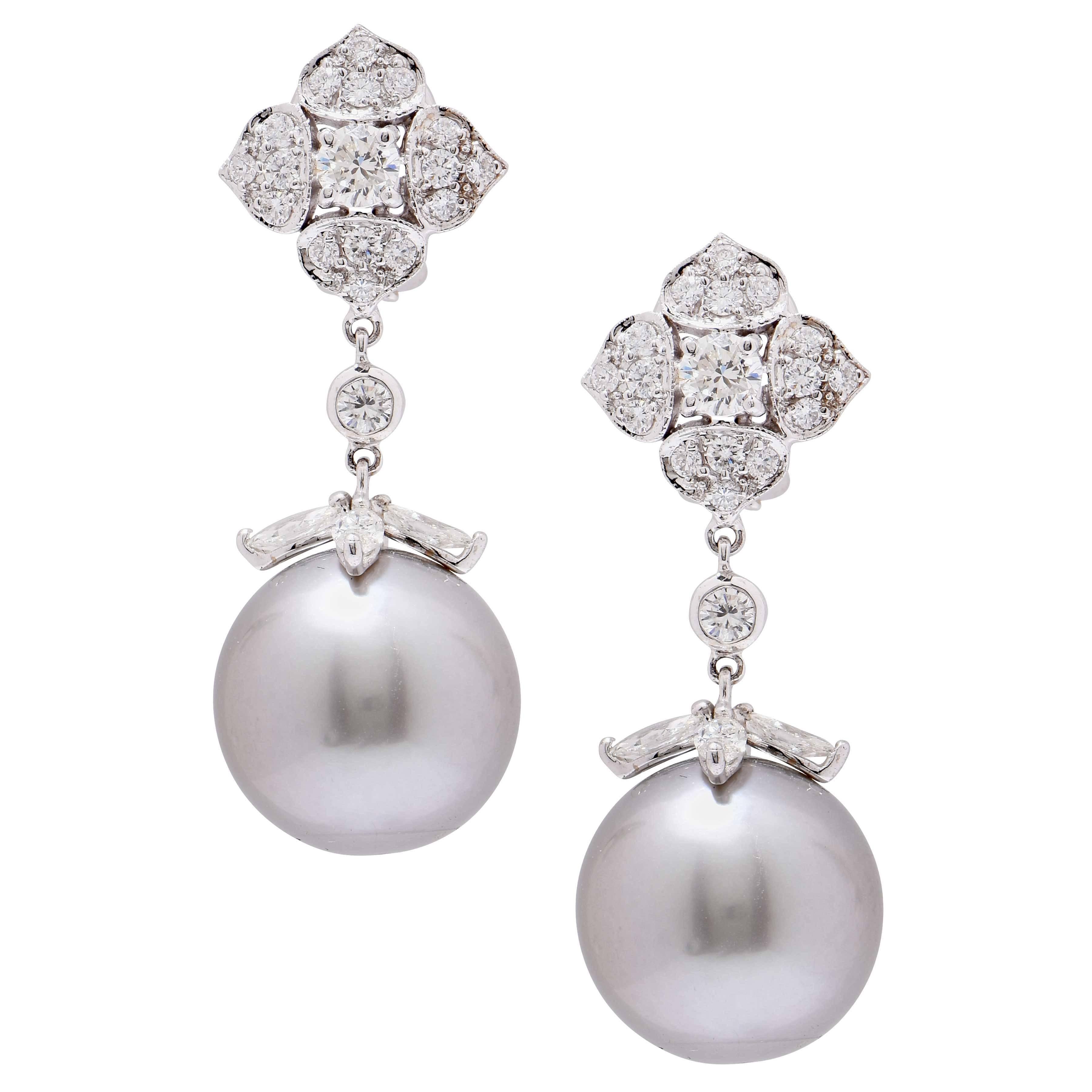 14.8 MM Gray Tahitian Pearl and Diamond Earrings with detachable seed pearl drops set in 18 karat white gold. This wonderful pair of earrings feature 110 round cut diamonds with an estimated total weight of 3.15 carats as well as 8 marquise cut