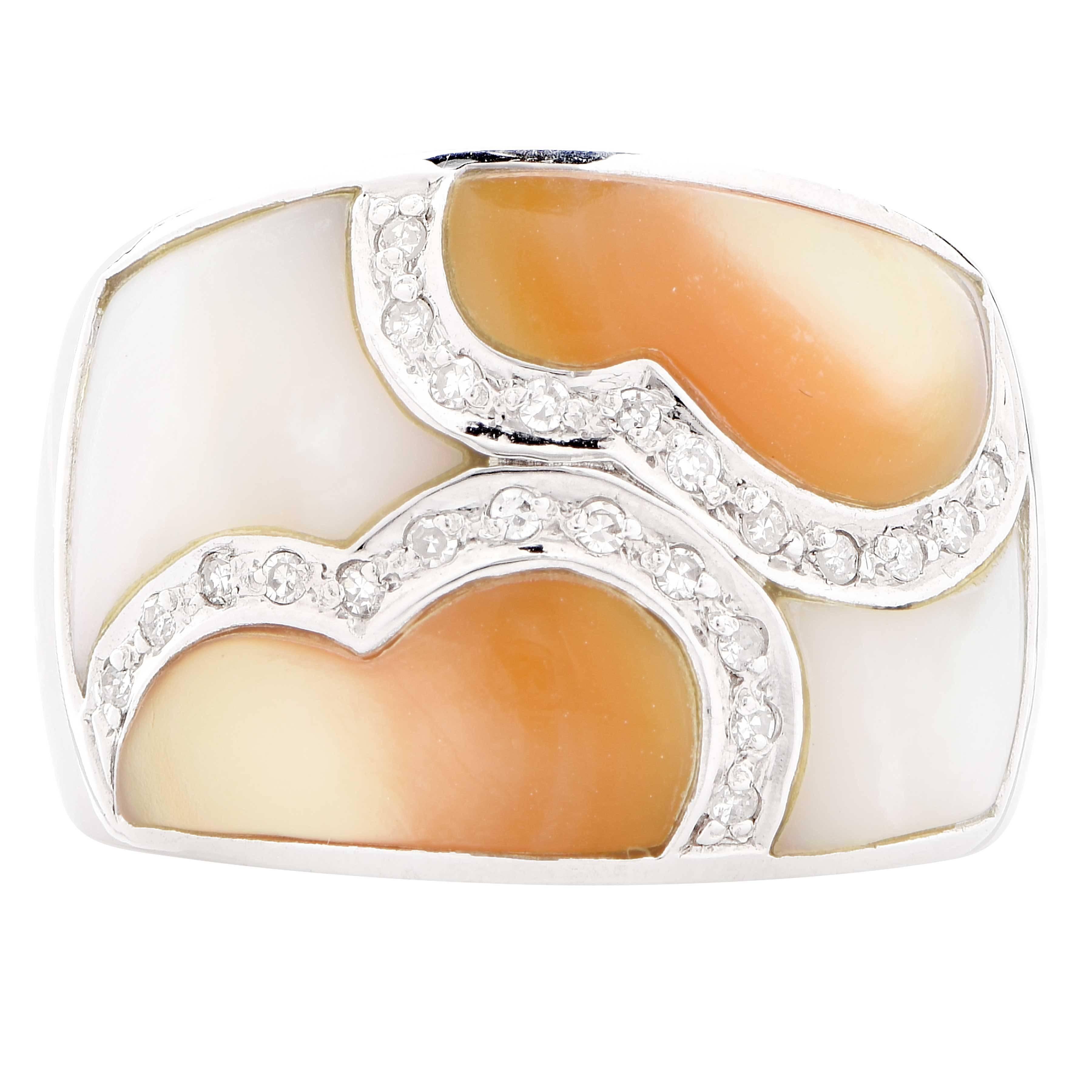 This lovely fashion ring features four enamel panels as well as 23 round cut diamonds with an estimated total weight of .23 carat set in 14 karat white gold.

Ring Size: 6 3/4 (can be sized)
Metal Type: 14 Karat White Gold
 