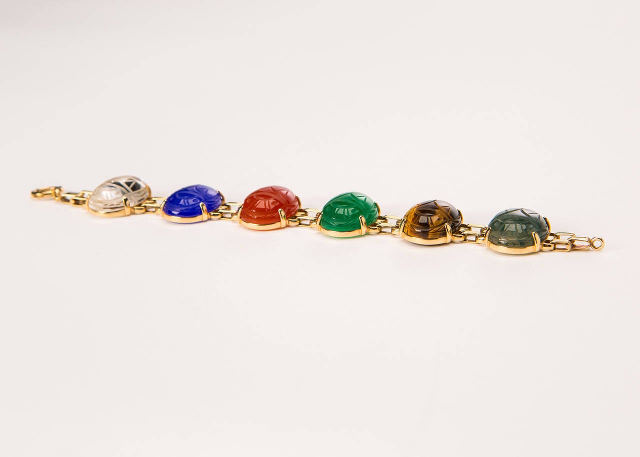 Six beautifully carved hard stone scarabs, each 1 inch X 3/4 inch are set in this classic bracelet. 7 1/2 inches in length. This bracelet pairs perfectly with my 7 stone scarab bracelet.
