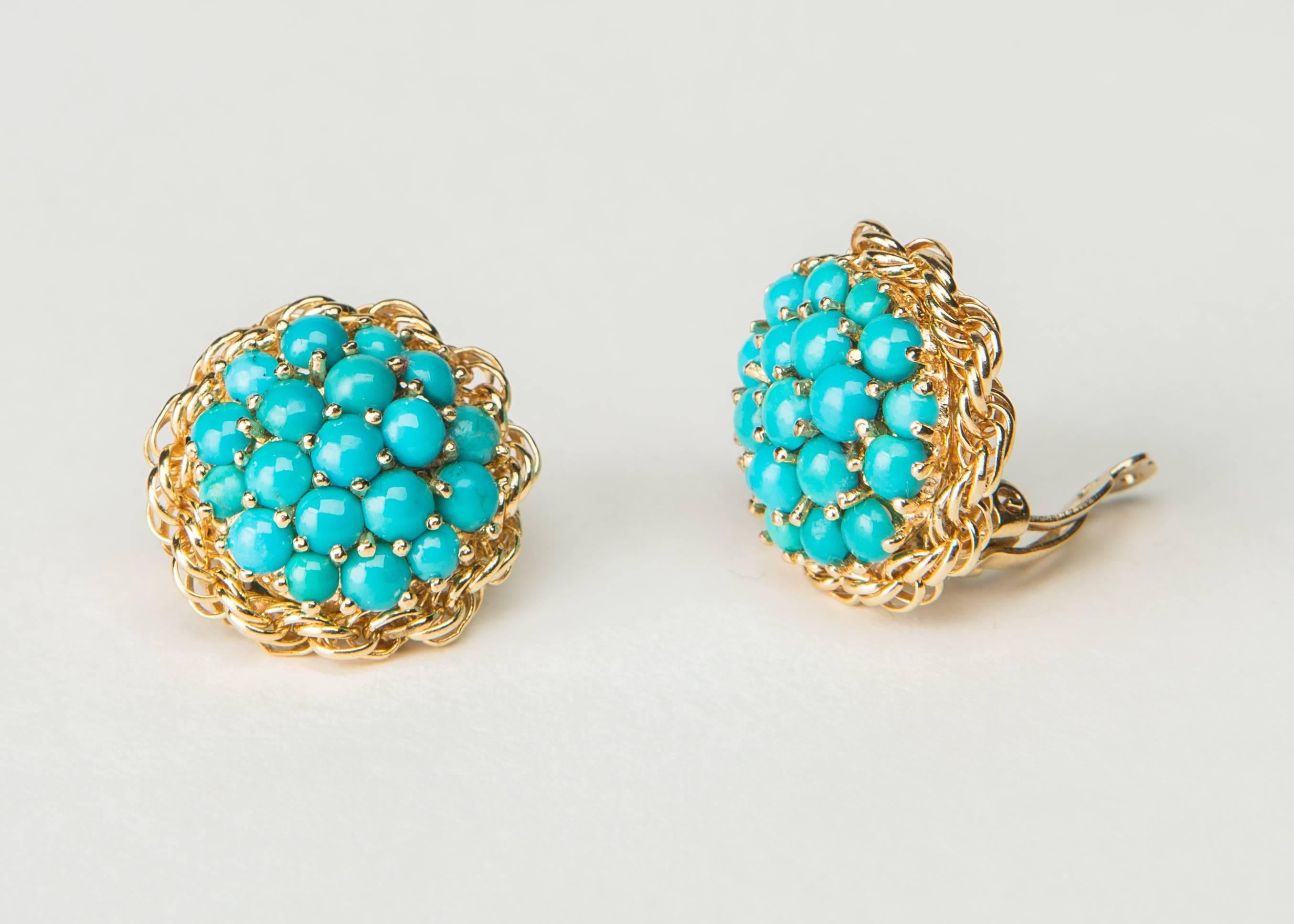 This elegant and chic turquoise earring is a perfect example of Cartier at its best. 7/8's of an inch in size.
