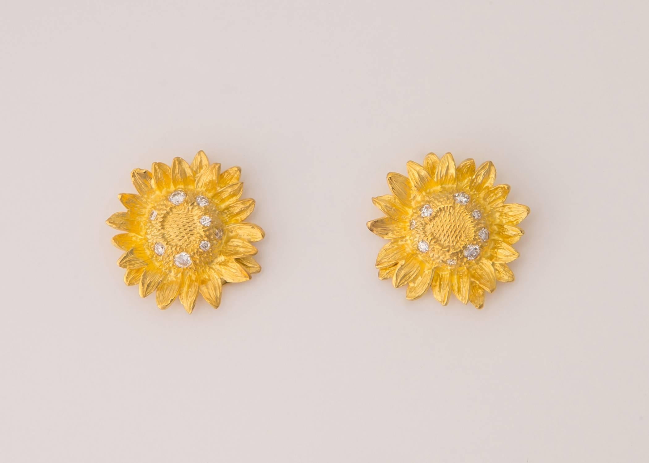 The iconic British Jeweler Asprey was founded in 1781.  They are famous for their sun flower earrings. Great detailing and texture with 16 brilliant diamond sprinkled in make this truly special. At 3/4's of an inch its an easy to wear choice. Please