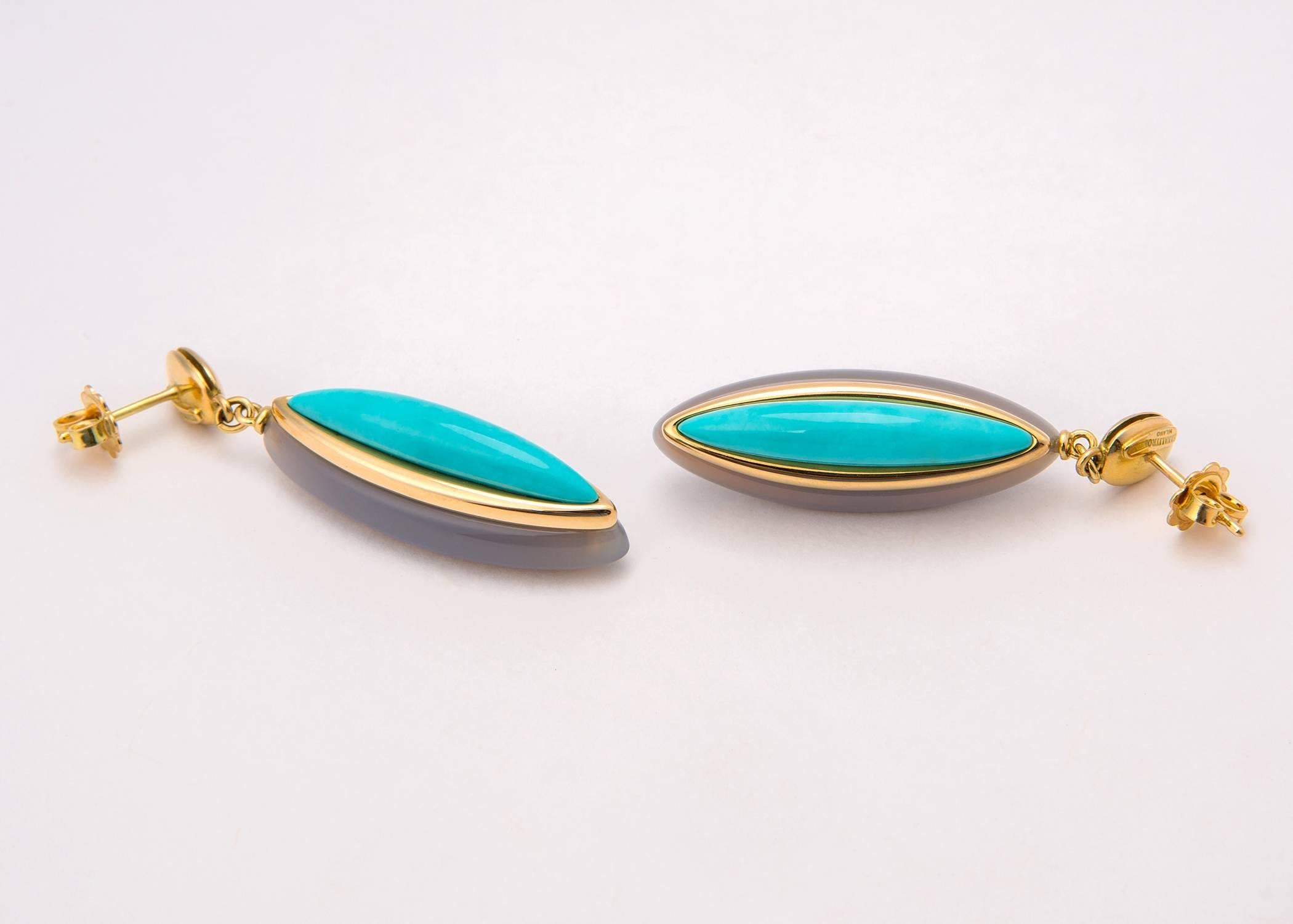 Simply Chic. Vivid turquoise is set against grey agate and framed with rich 18k gold. Handmade in Italy. Please view additional picture to see the profile dimension. 2 inches in length. 
