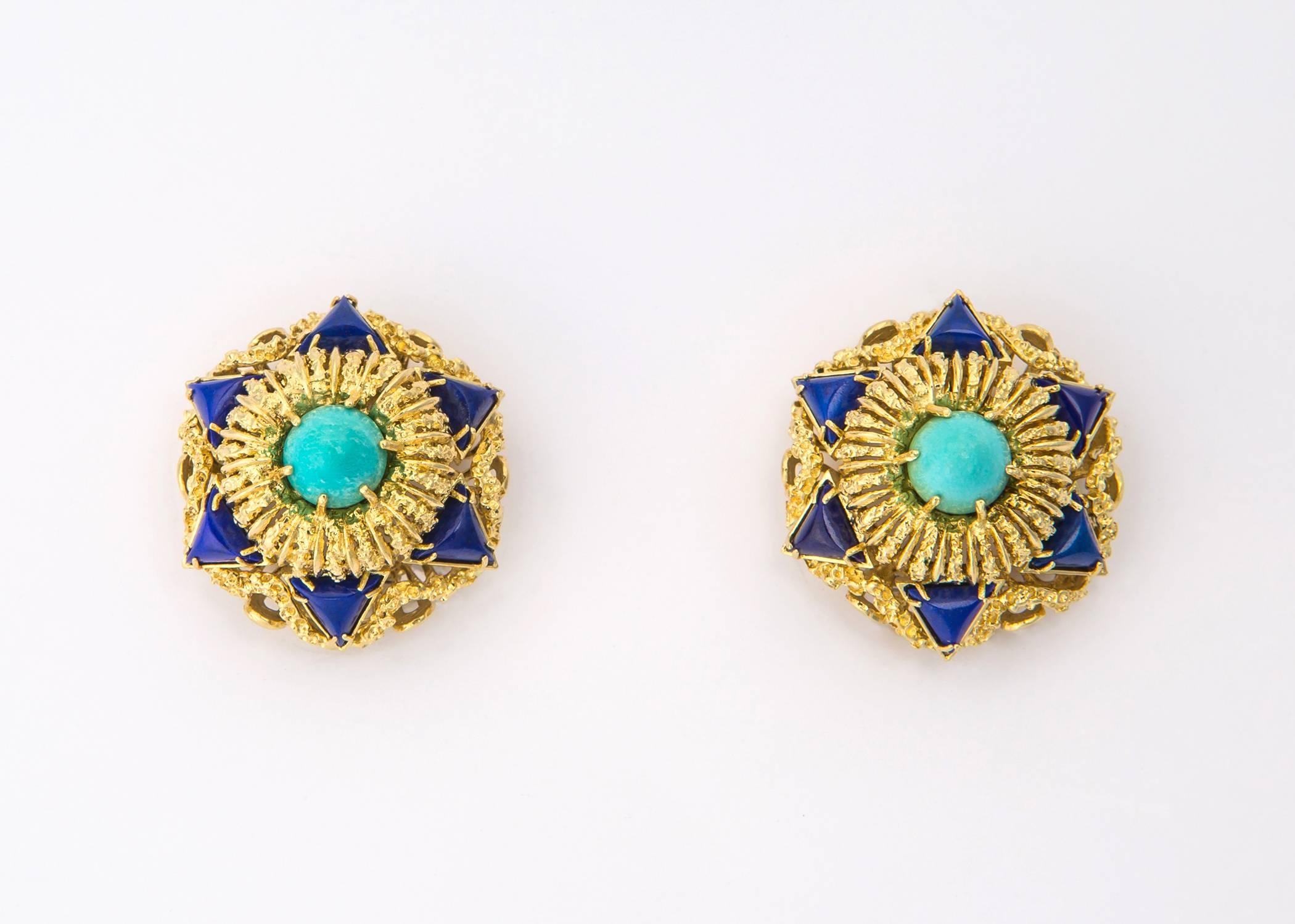 Bold and dimensional. Exceptional texture and detailing turn this earring into wearable art. Turquoise and lapis are the perfect color combination. A truly chic statement piece. 1 inch in size. 
