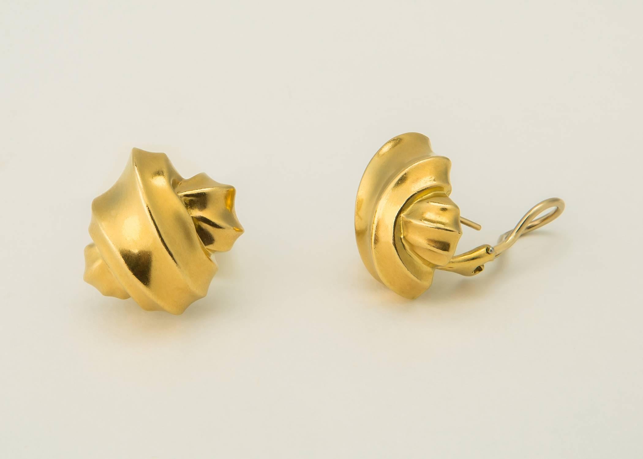 Angela Cummings iconic designs have stood the test of time. Soft ribbons of 18k gold create this wearable earring. 7/8's of an inch in size. 