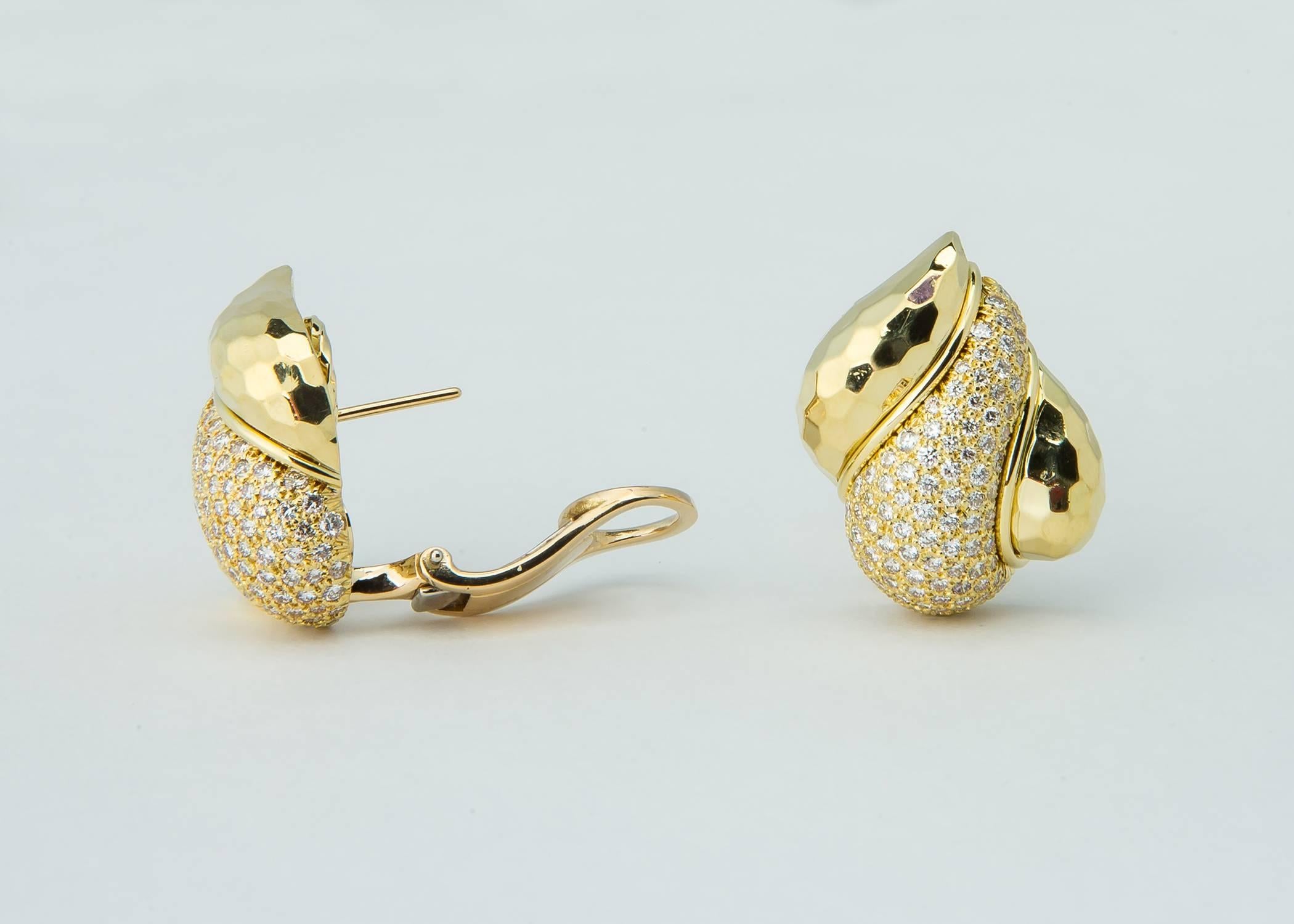 These soft flattering earrings are from Henry Dunay's popular faceted gold collection. 3.50 carats of brilliant cut diamonds are framed with rich 18k gold. 24.00 mm or just under 1 inch in size. 