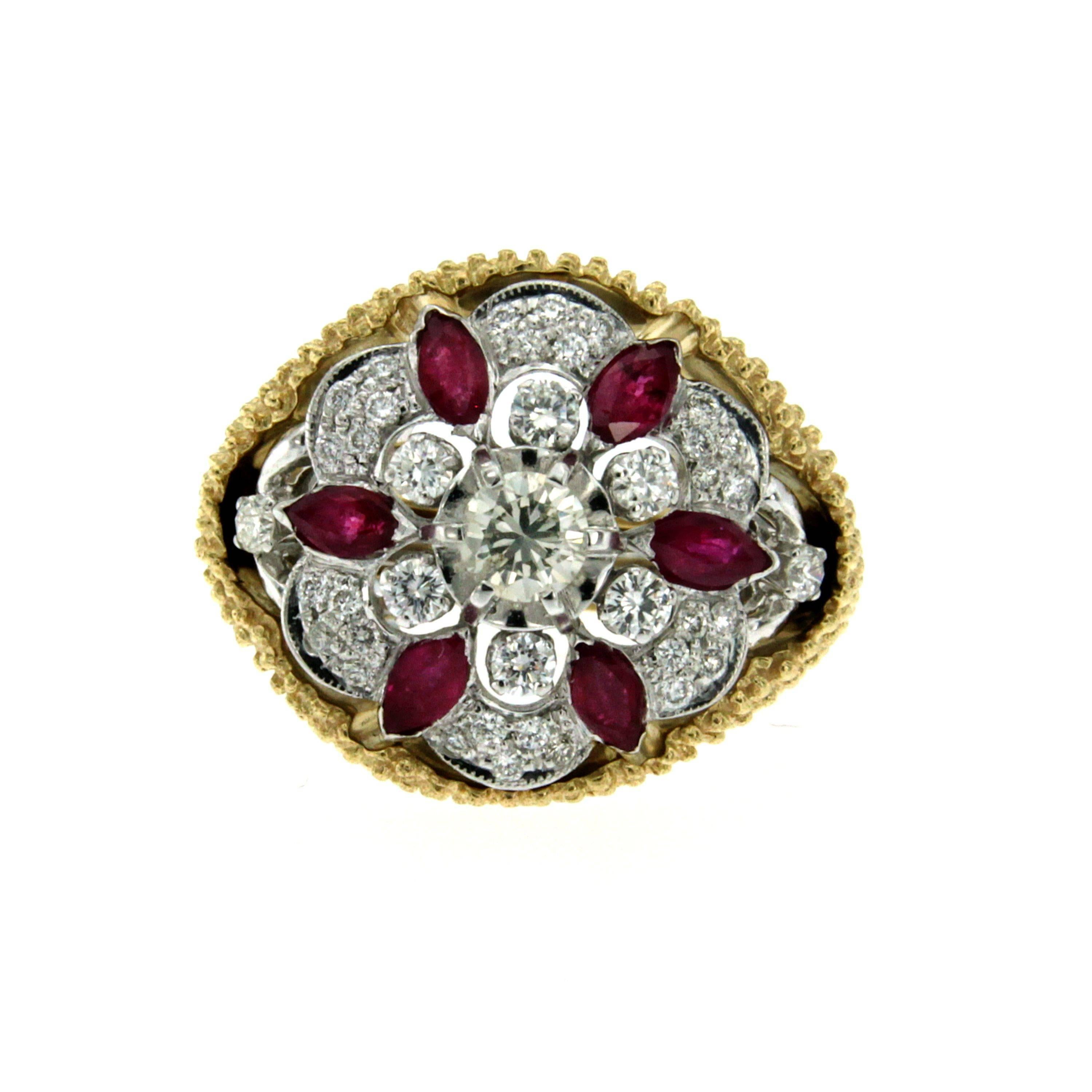 A master-crafted detachable 18k Gold ring composed of round brilliant cut Diamonds weighing approx. 0.90 ct  graded color F-G clarity Vs and navette cut Rubies of approx. 0.95 total carats.
The ring features a detachable yellow Gold frame. Circa