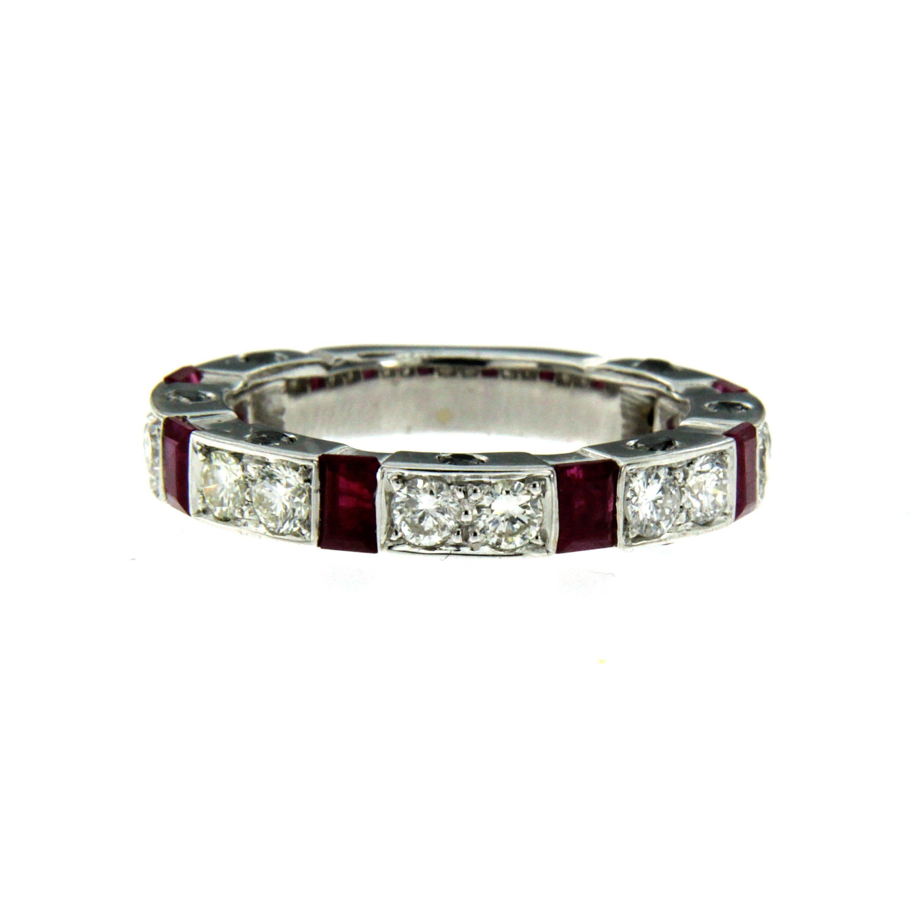 This stunning white gold band ring features round brilliant cut diamonds with a total weight of 1.12 carats G color VVS, 6 rubies weighing totally 0.70 cts and 0.42 cts of black diamonds adorning both sides. 

CONDITION: Brand New
METAL: 18k