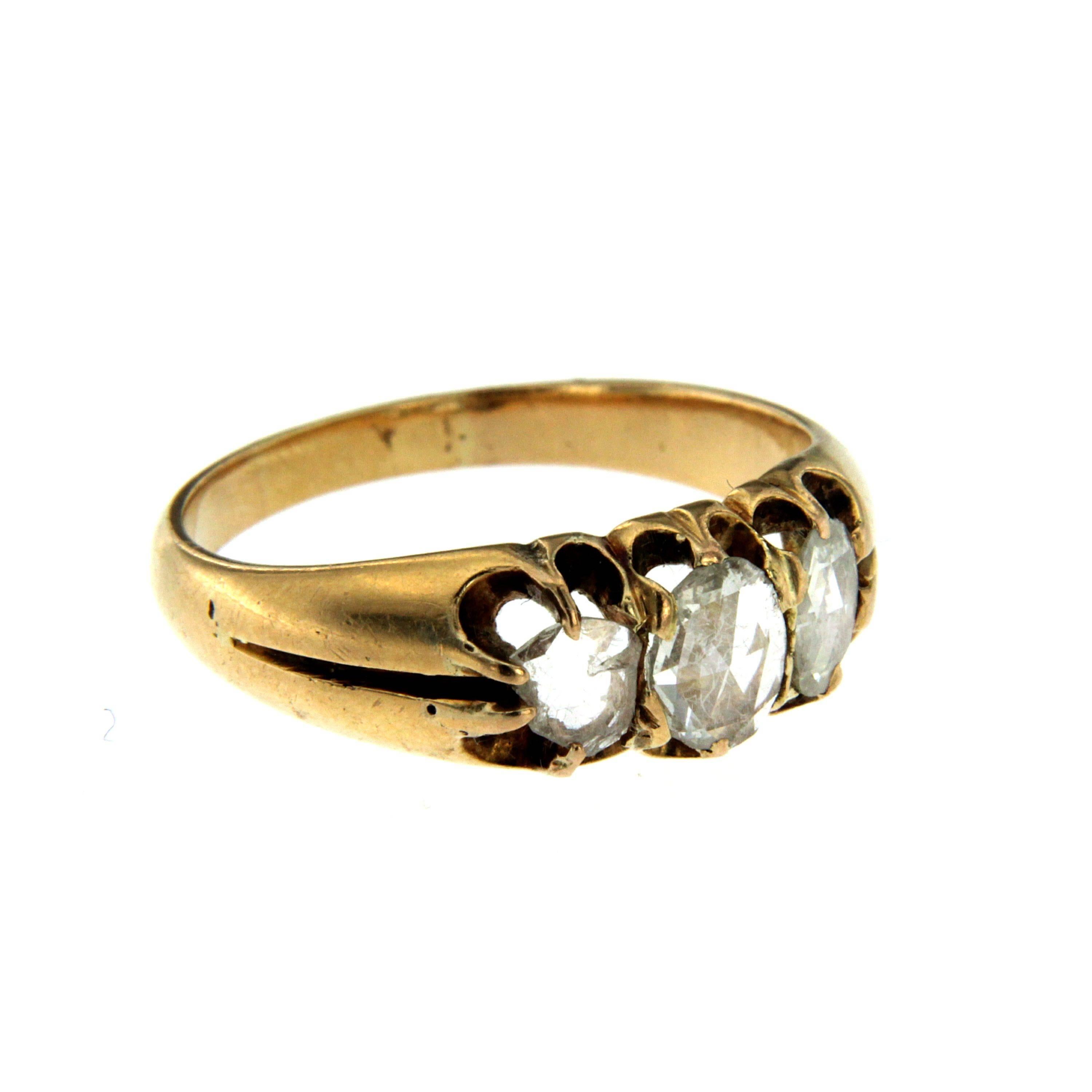 A gorgeous Victorian three stone ring modelled in 18k yellow Gold and set with 0.50 ct rose cut diamonds. Very fine claws hold the stones in an open gallery. Circa 1820

CONDITION: Pre-Owned - Excellent
METAL: 18k Yellow Gold
GEM STONE: Diamond 0.50