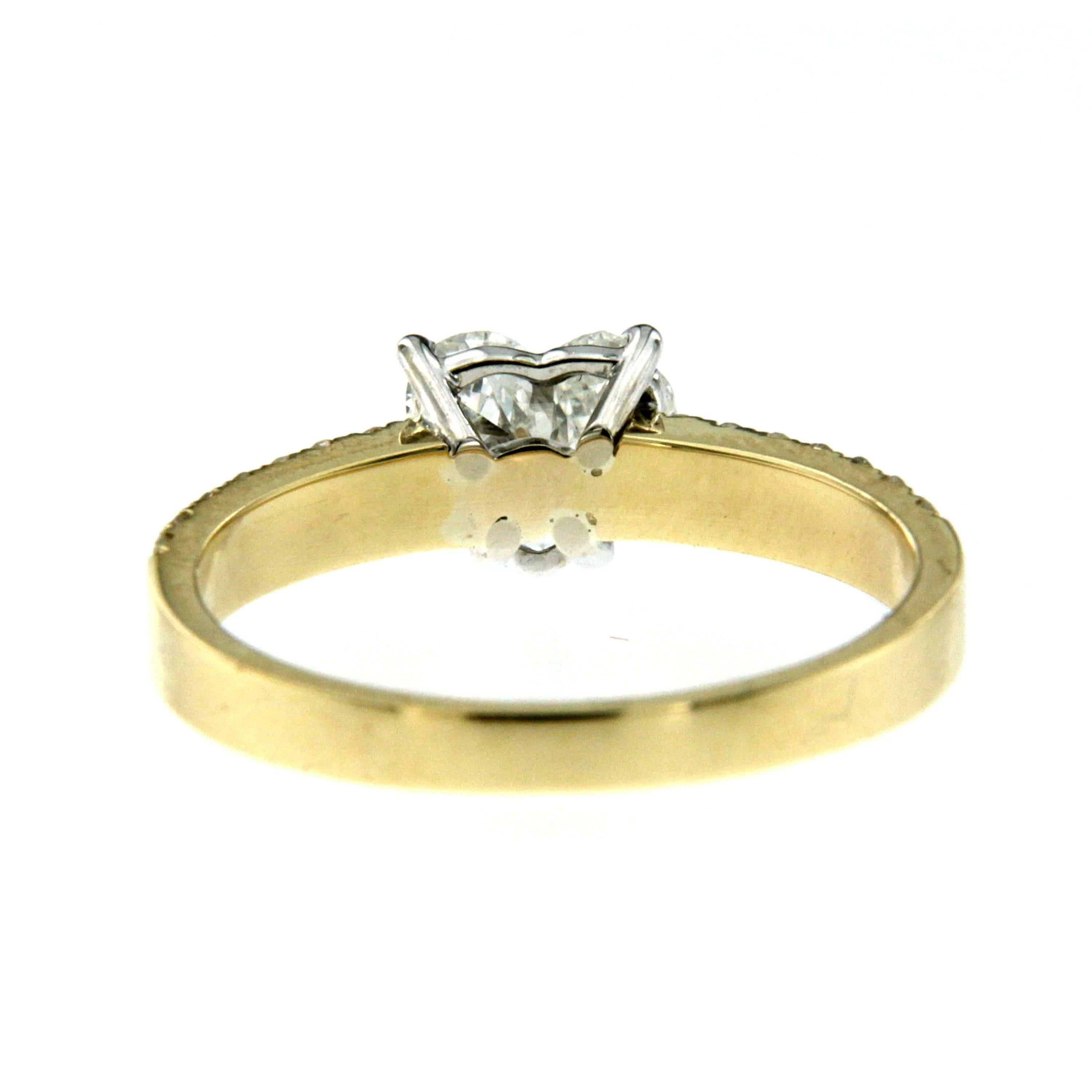 0.70 carat diamond ring on hand
