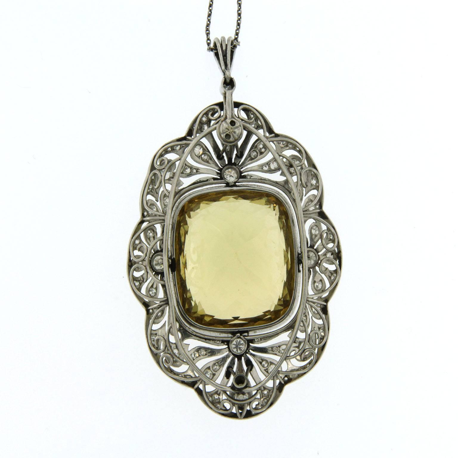 A fine and Rare Victorian pendant/brooch approximately 45 carats Heliodor set in 18k white gold,  framed by approximately 3 ct diamonds. The pendant can also be converted in to a brooch.
Heliodor measurements: 23 mm by 22 mm, dept 14.06 mm.
Gold