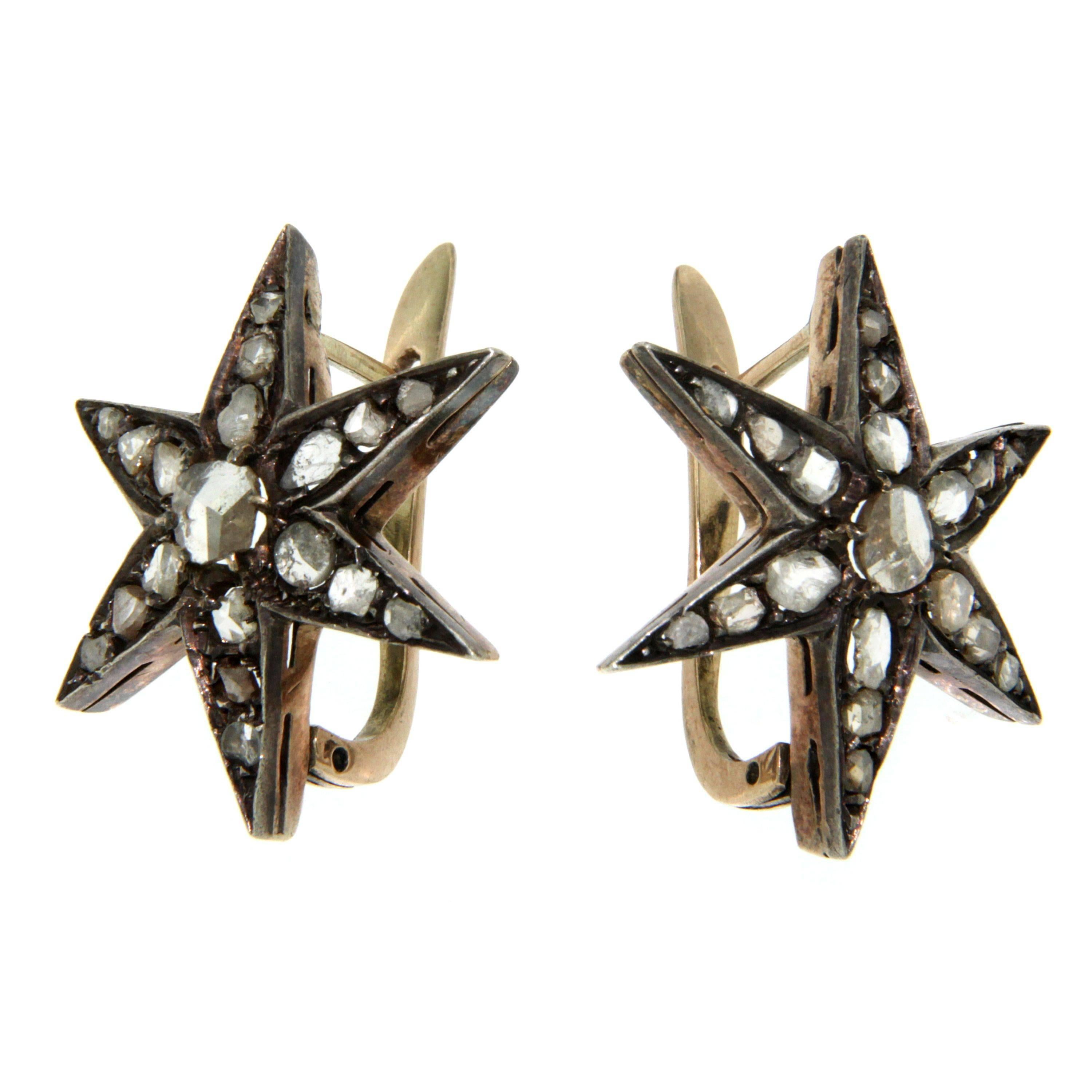 Antike Diamantstern-Ohrringe:: besetzt mit Diamanten im Rosenschliff:: montiert in Silber und massivem 12-karätigem Gold. Um 1880. 
Geschätztes Gesamtgewicht der Diamanten .80cts
Bruttogewicht: 6.00 gr

* das Juwel kommt mit der Garantie