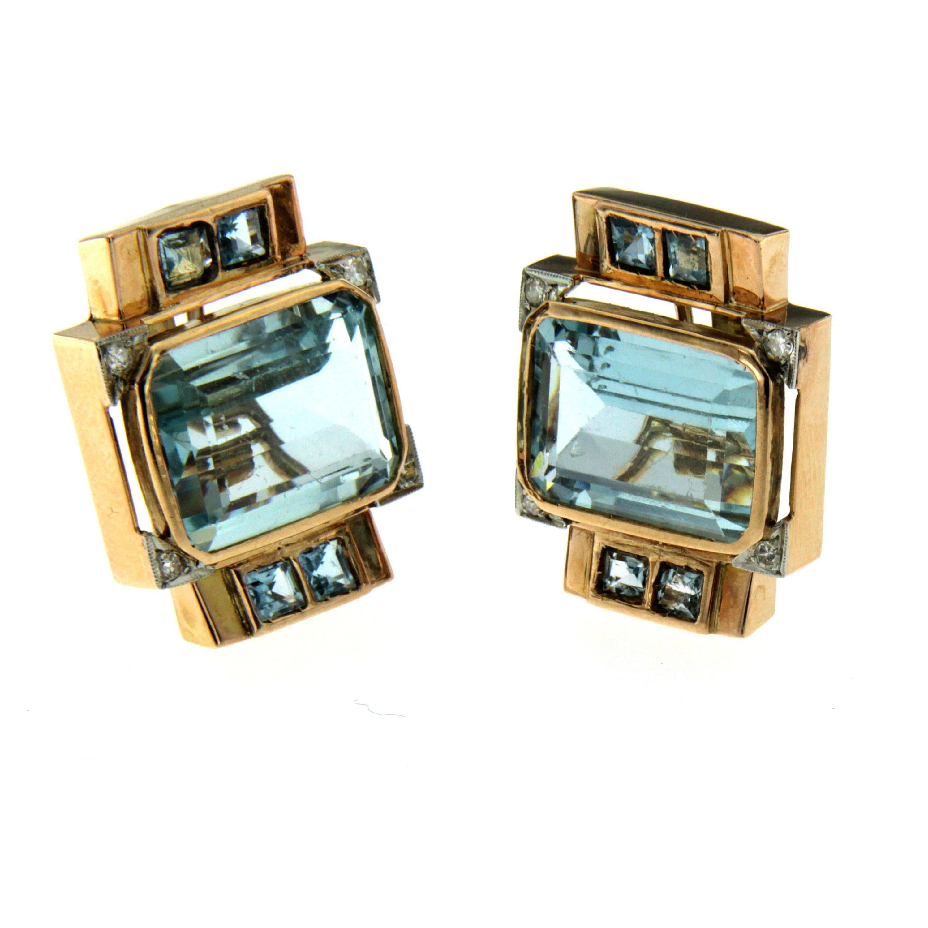 A pair of enchanting aquamarine and diamond earrings totaling approximately 16.88 ct aquamarine accented with round cut diamonds totaling approximately 0.24  carat. 
All set in 18 kt yellow gold
Post and omega backs. 
Gross Weight: 17.4