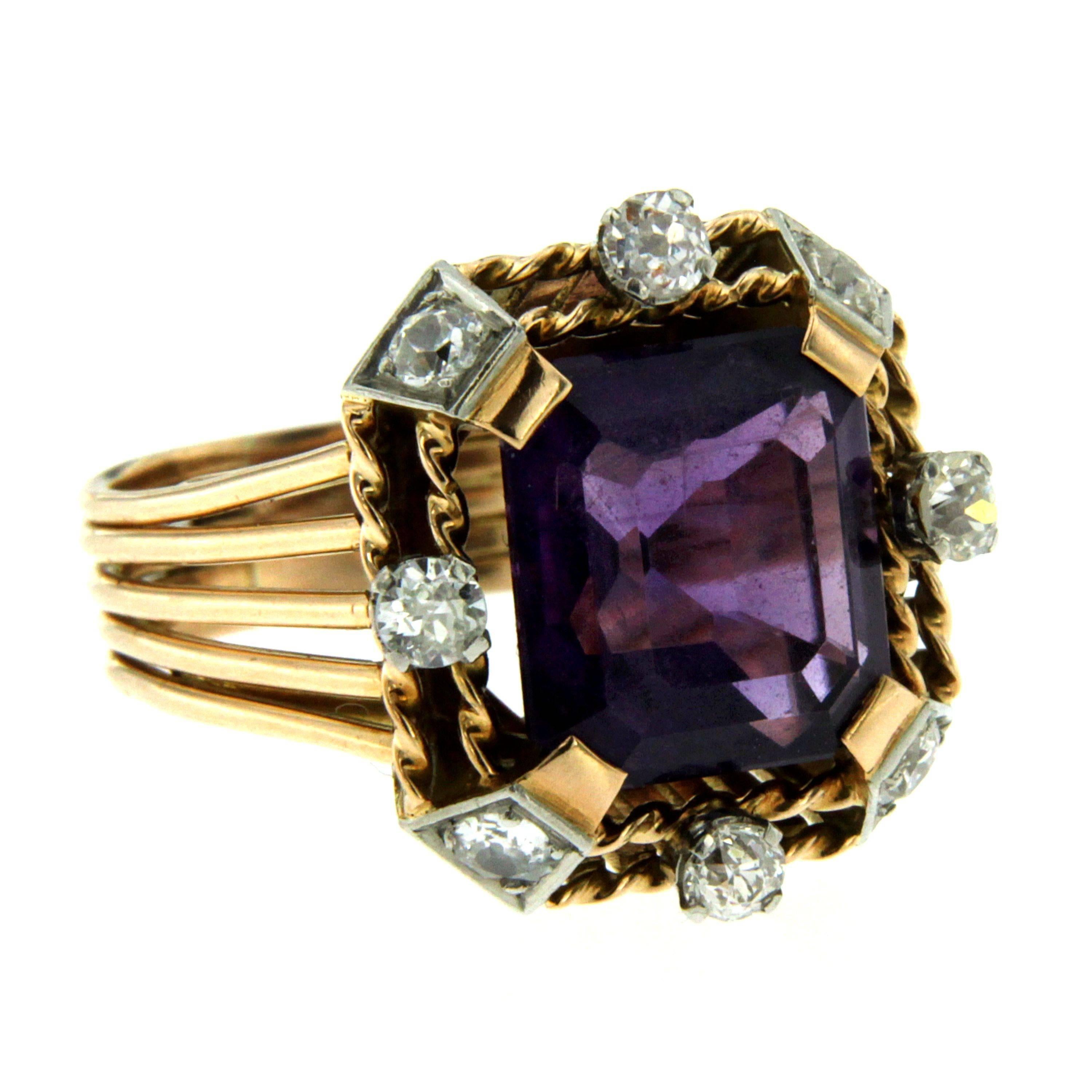 A beautiful natural 5.62 carats Russian Amethyst of rich color set in rose and white 18k gold in an exquisite Cocktail Ring. Origin Italy 1950
The center stone is surrounded by 8 round cut diamonds totaling approximately 0.90 carat. 
This piece is