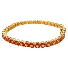 Bracelet tennis en or jaune avec saphir Padparadsha naturel de 11 carats