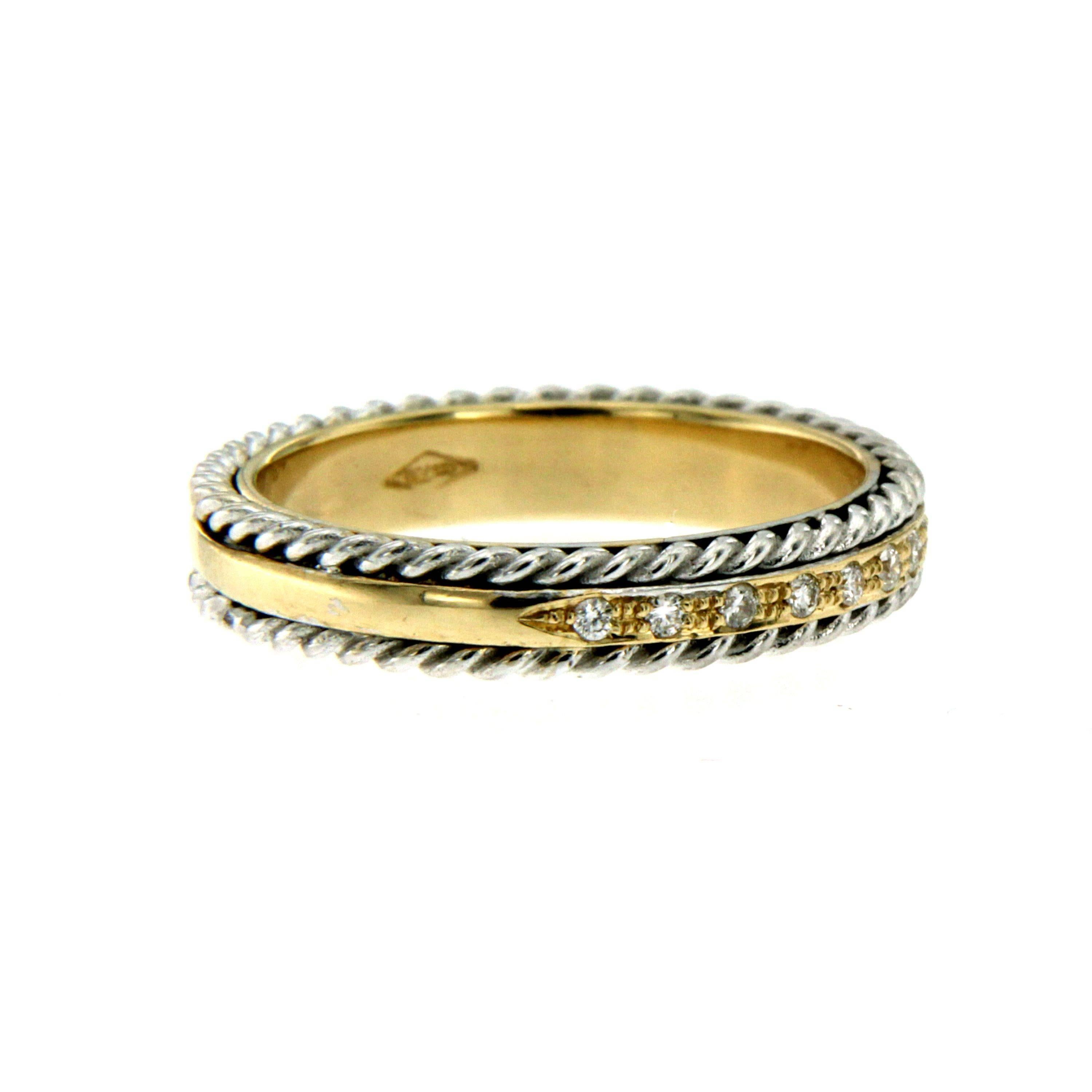 A gorgeous 18k gold band ring set with 0.10 cts of Diamonds, comprised of a high polished yellow gold background, upon which are soldered two twisted rope motifs.

CONDITION: Brand New 
METAL: 18k yellow and white Gold
GEM STONE: Diamond 0.10 total