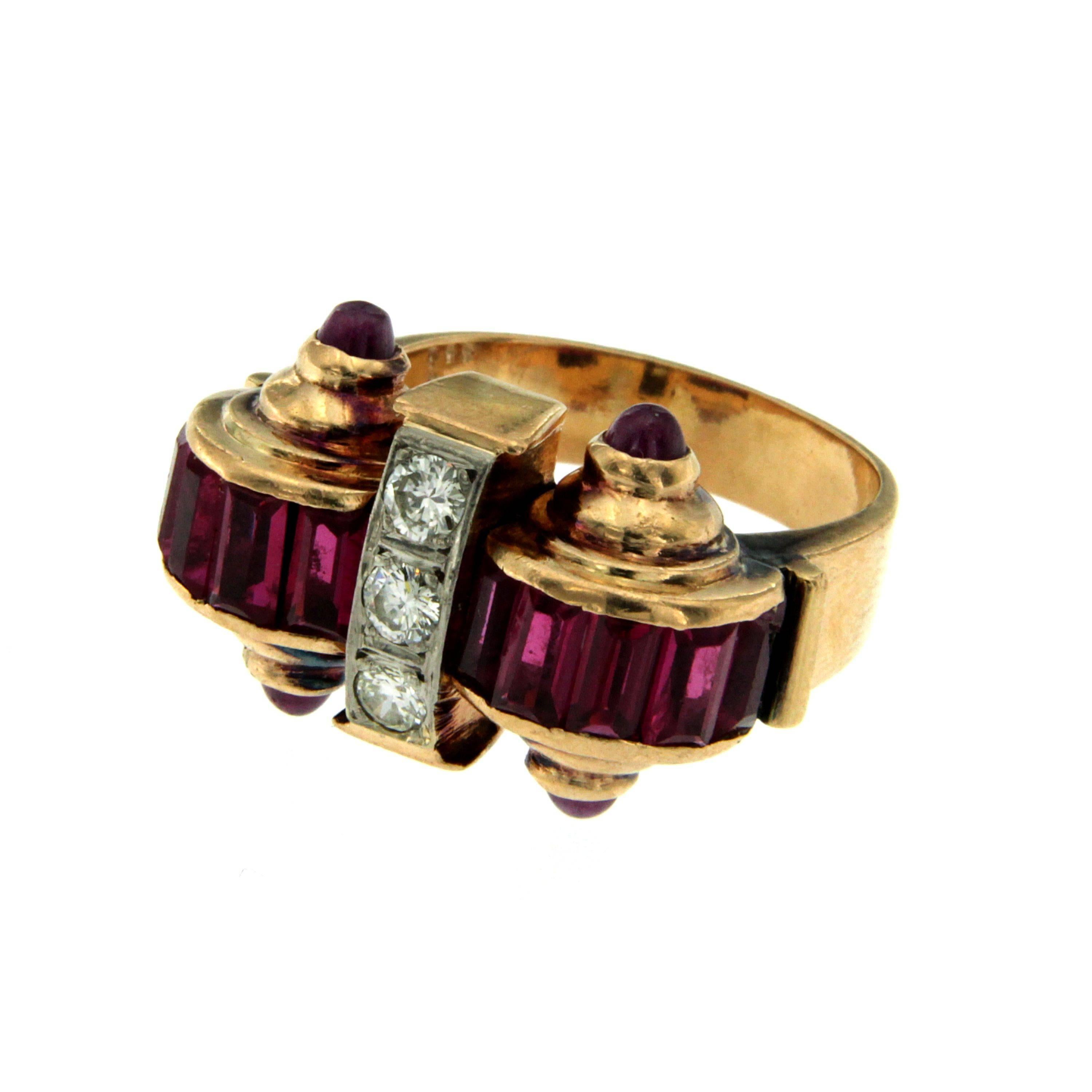 Beautiful Retro Ring handcrafted in 18k Rose Gold. The center is set with 3 round brilliant cut diamonds .60cts Color H, Clarity VS, accented by 10 baguette cut Rubies and 4 cabochon Rubies approx. 2.00 total carats. Circa 1950

CONDITION: Pre-owned