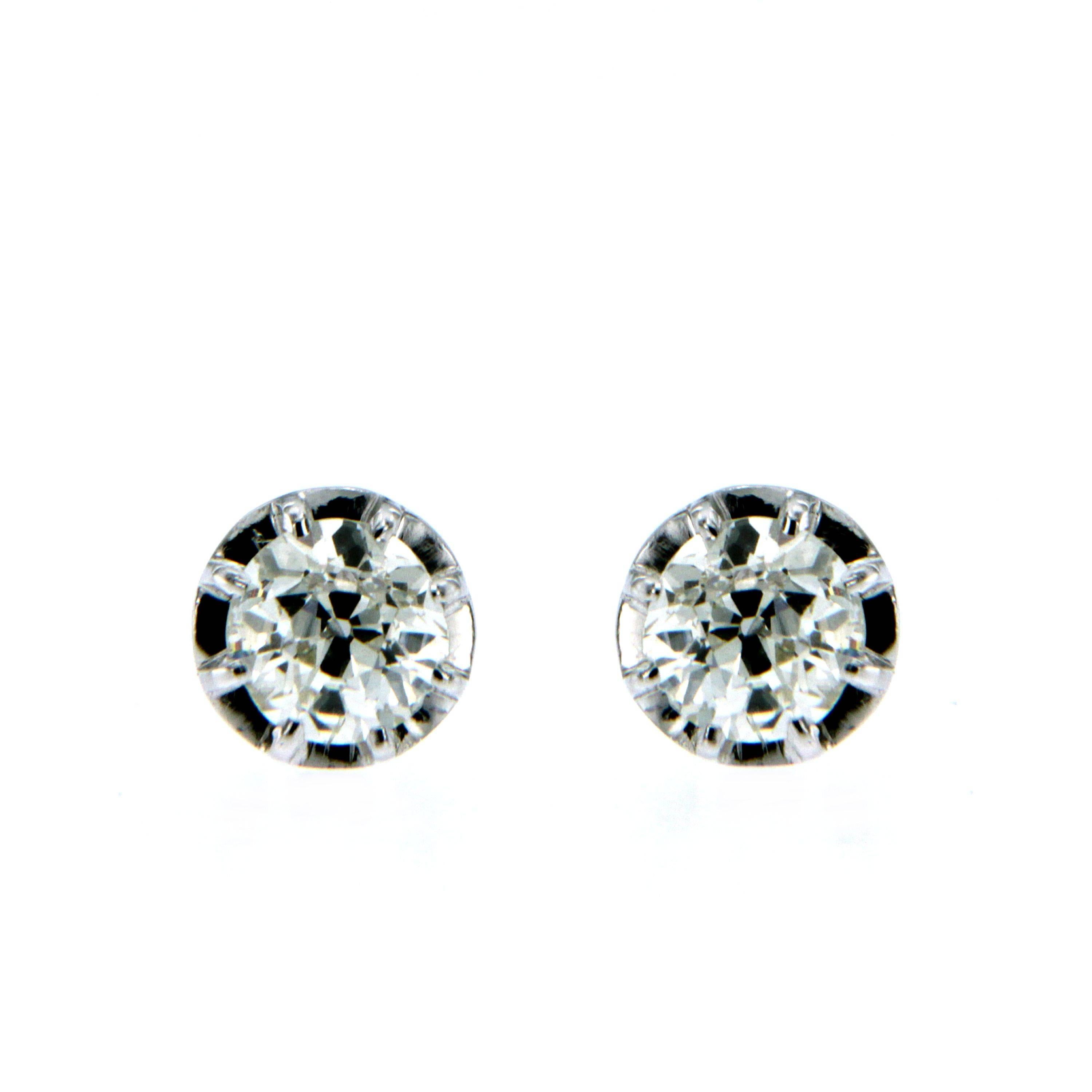 One pair of round diamond stud earrings weighing 0.80 carats H color VS, mounted in 18k white gold with 8 prongs. 
This setting sits perfectly and most comfortably on the ear.  The two diamonds are perfectly matched by our experience