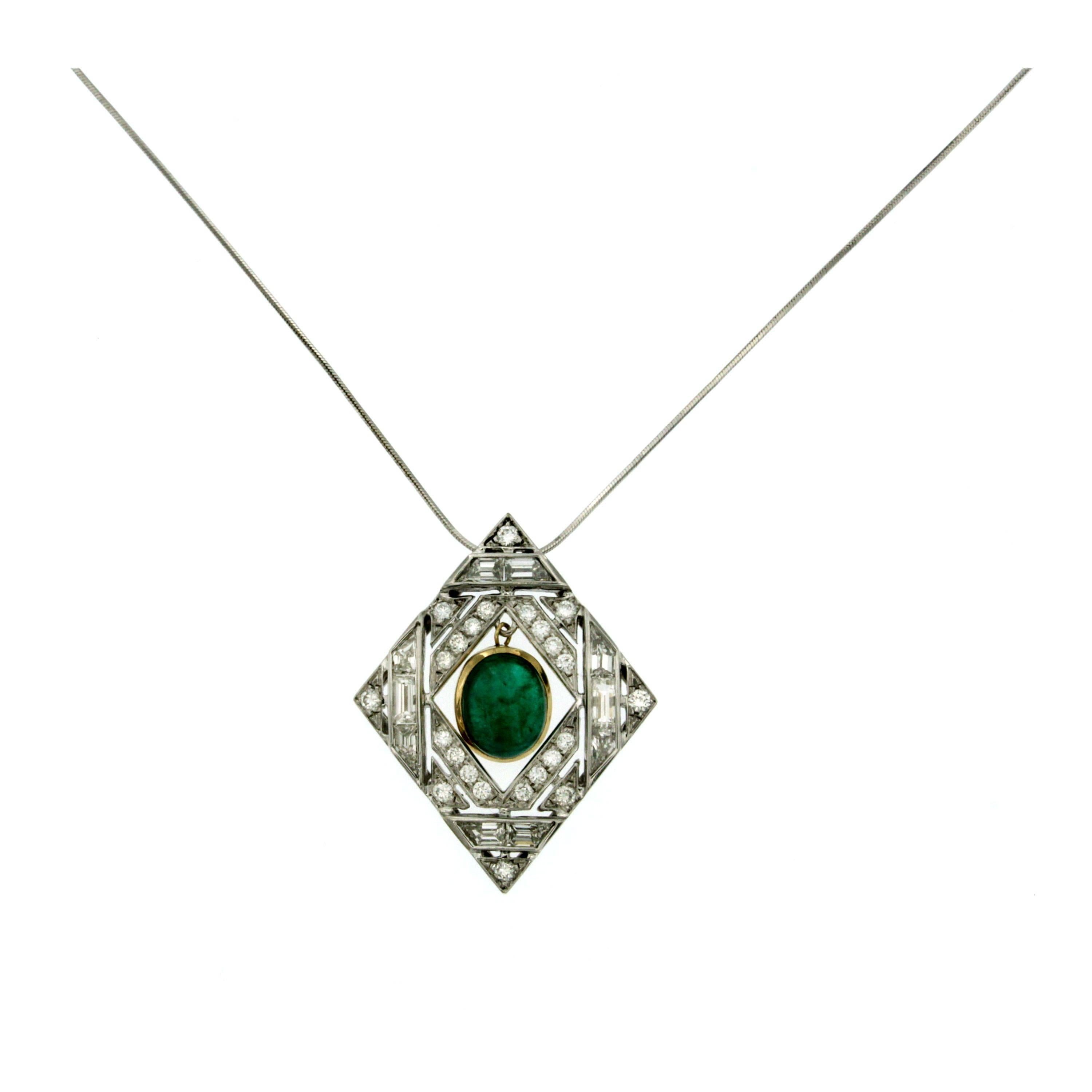 18K White gold Emerald and Diamond pendant.
The pendant is prong set with an approximately 2.50 carat cabochon natural emerald, beautiful medium to deep green color, surrounded by round brilliant and baguette cut diamonds totaling approx 2.70 cts