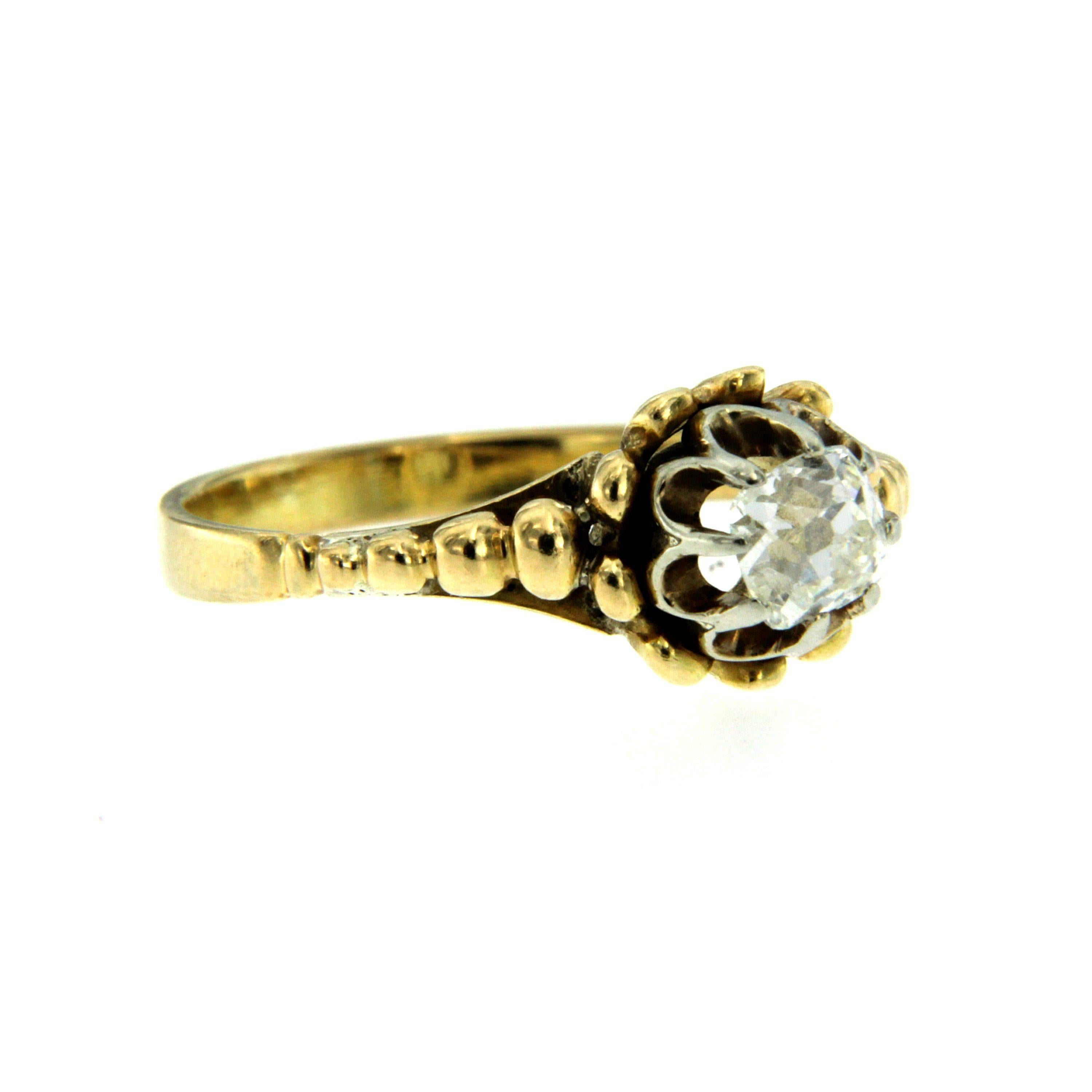 A gorgeous Victorian solitaire ring modelled in 18k Gold and set with a 0.50ct cushion cut diamond H color VVs. Eight very fine claws hold the stone in an open gallery. Perfect for everyday use

CONDITION: Pre-Owned - Excellent 
METAL: 18k yellow