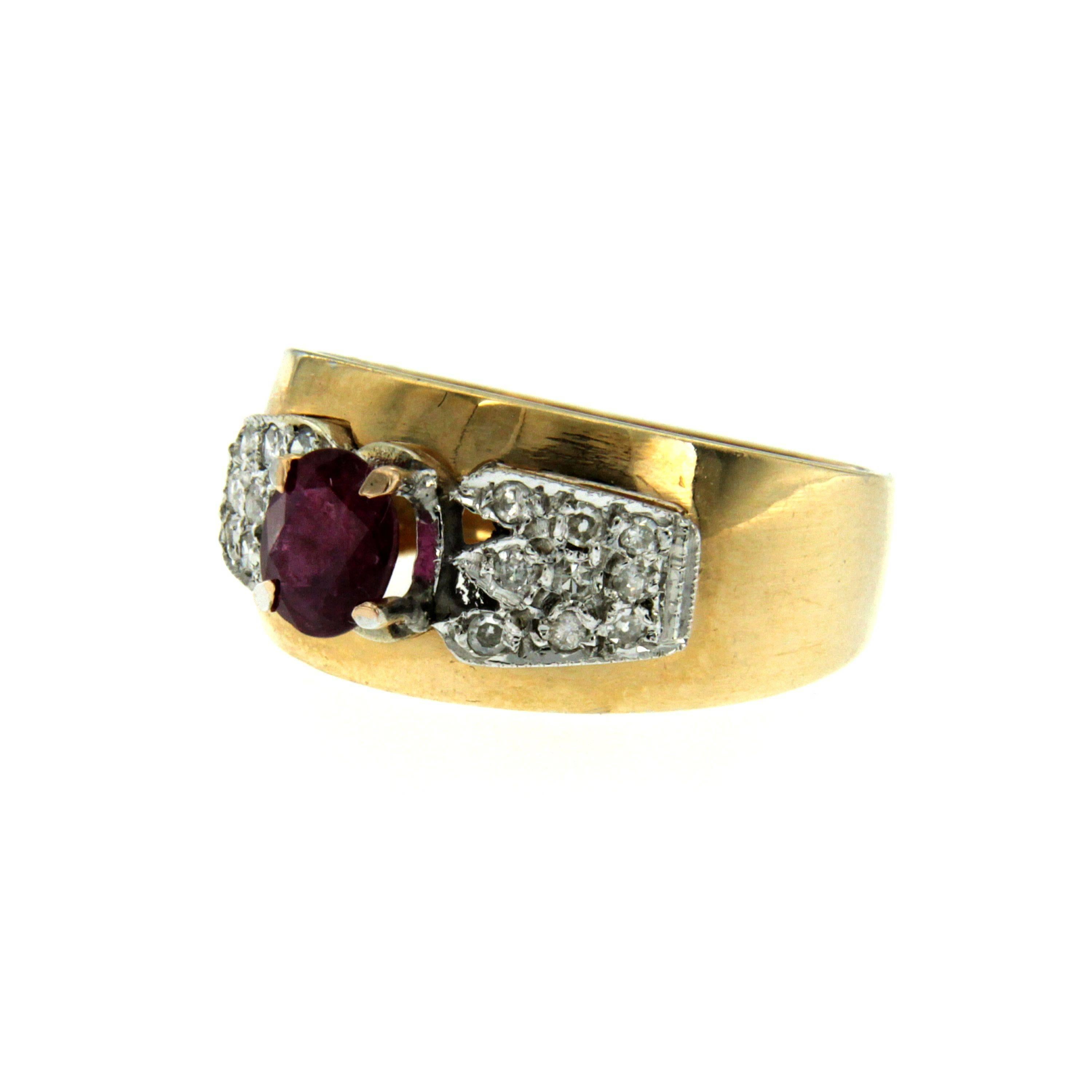 This vintage ring is handcrafted in 18k yellow gold set with an oval cut ruby weighing 0.80 carats accented by huit huit cut diamonds 0.20 total carats.

CONDITION: Pre-owned - Excellent
METAL: 18k Gold
GEM STONE: Ruby 0.80 total carats, Diamond