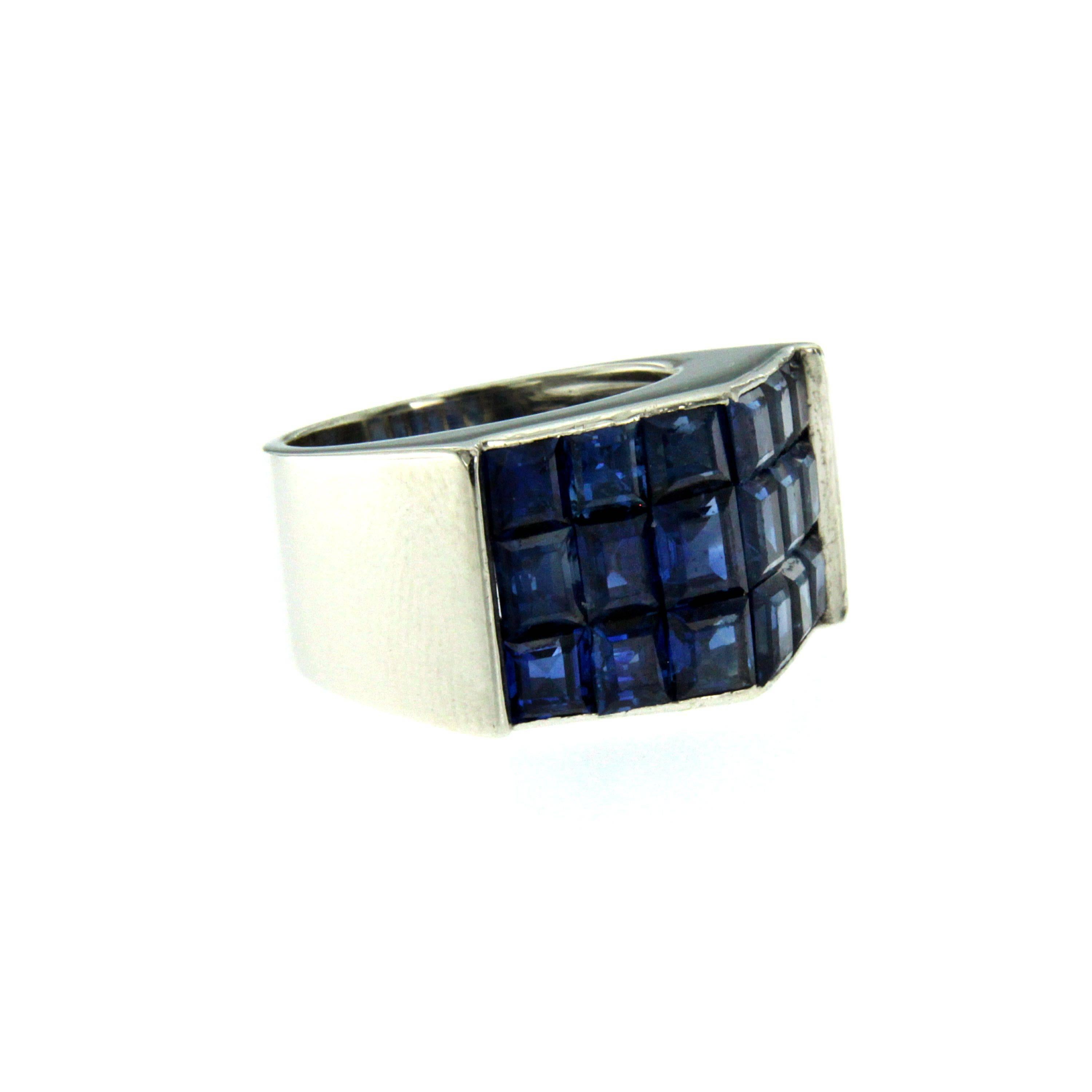 Vintage Van Cleef & Arpels Sapphire band ring set in 18k white gold.
The top of this ring is covered with 8.00 carats of natural strong color burmese sapphire all square cut. Circa 1980s

CONDITION: Pre-owned - Excellent 
METAL: 18k White Gold
GEM