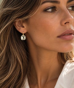 Boucles d'oreilles pendantes Pomellato Nudo Classic en topaze blanche et or jaune 18 carats