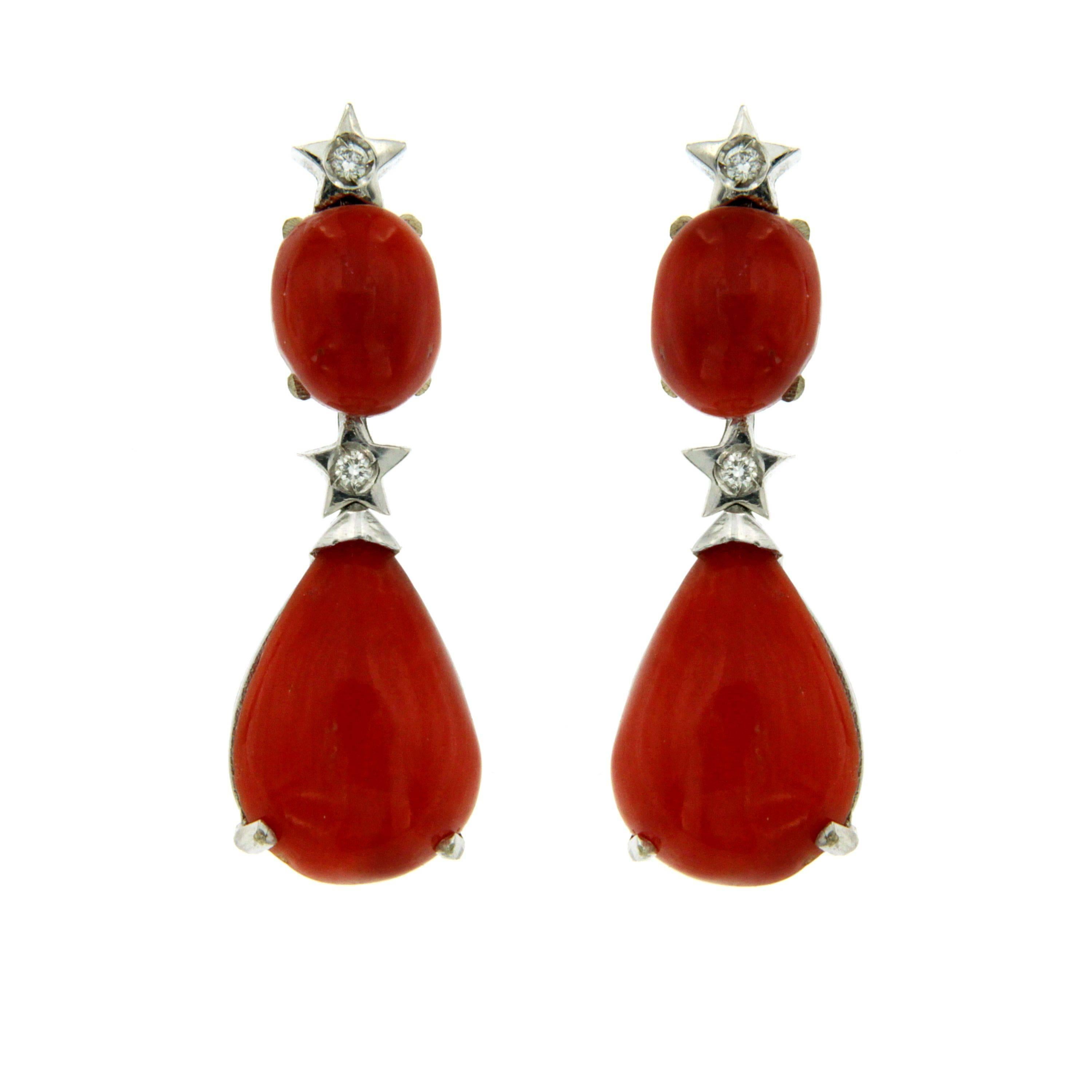 Vintage earrings handcrafted in 18k white gold showcasing four drop Sardinian Coral  2.20 total grams and accented by 0.10 carats of diamonds. Circa 1980

CONDITION: Pre-owned - Excellent 
METAL: 18k white Gold 
STONE: Coral 2.20 grams - Diamond