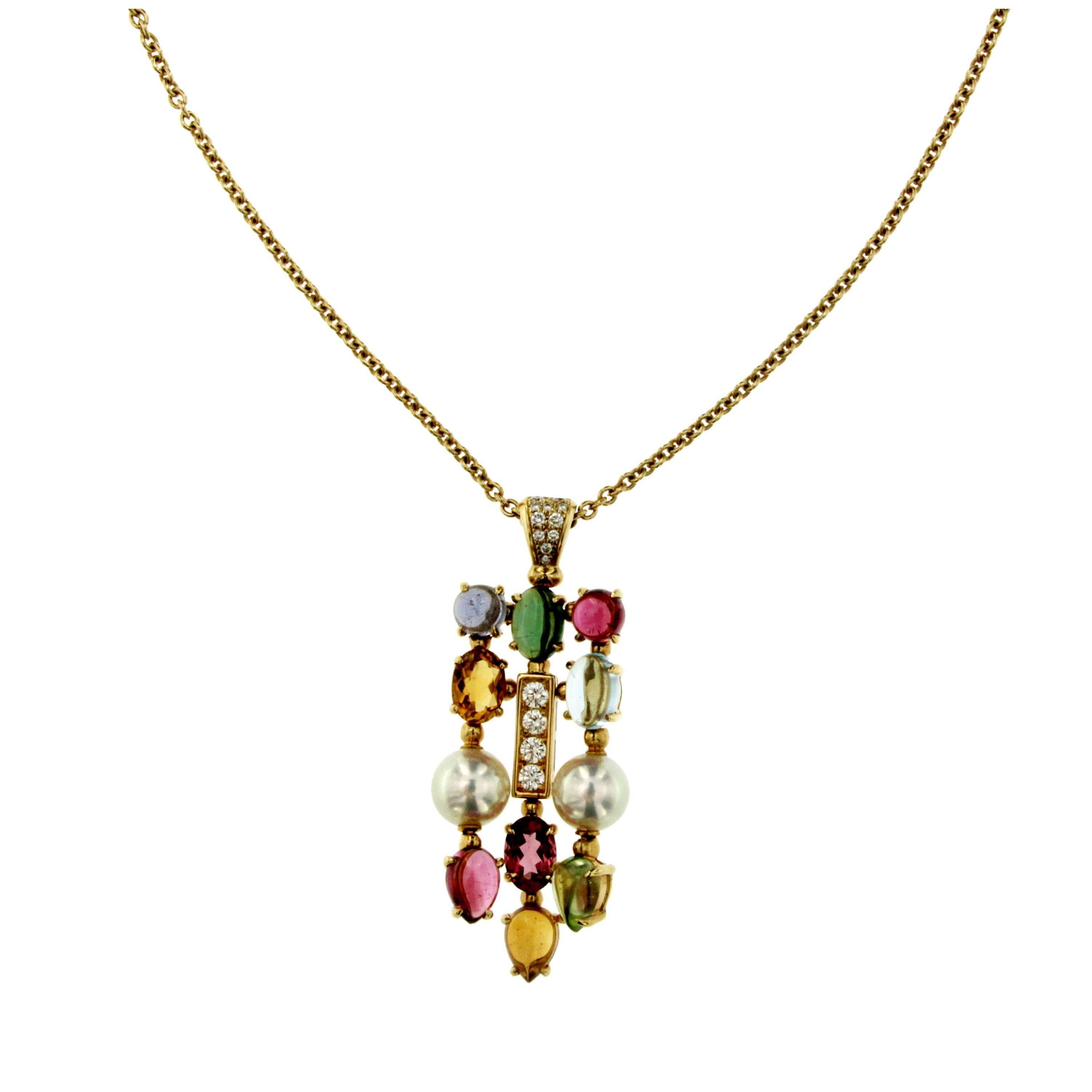 Bulgari's Allegra collection embodies the brand's distinctive and evergreen use of colored gemstones for a distinctive and playful elegance. This 3-row long pendant necklace is made of 18K yellow gold and boasts a pendant set with pink and green