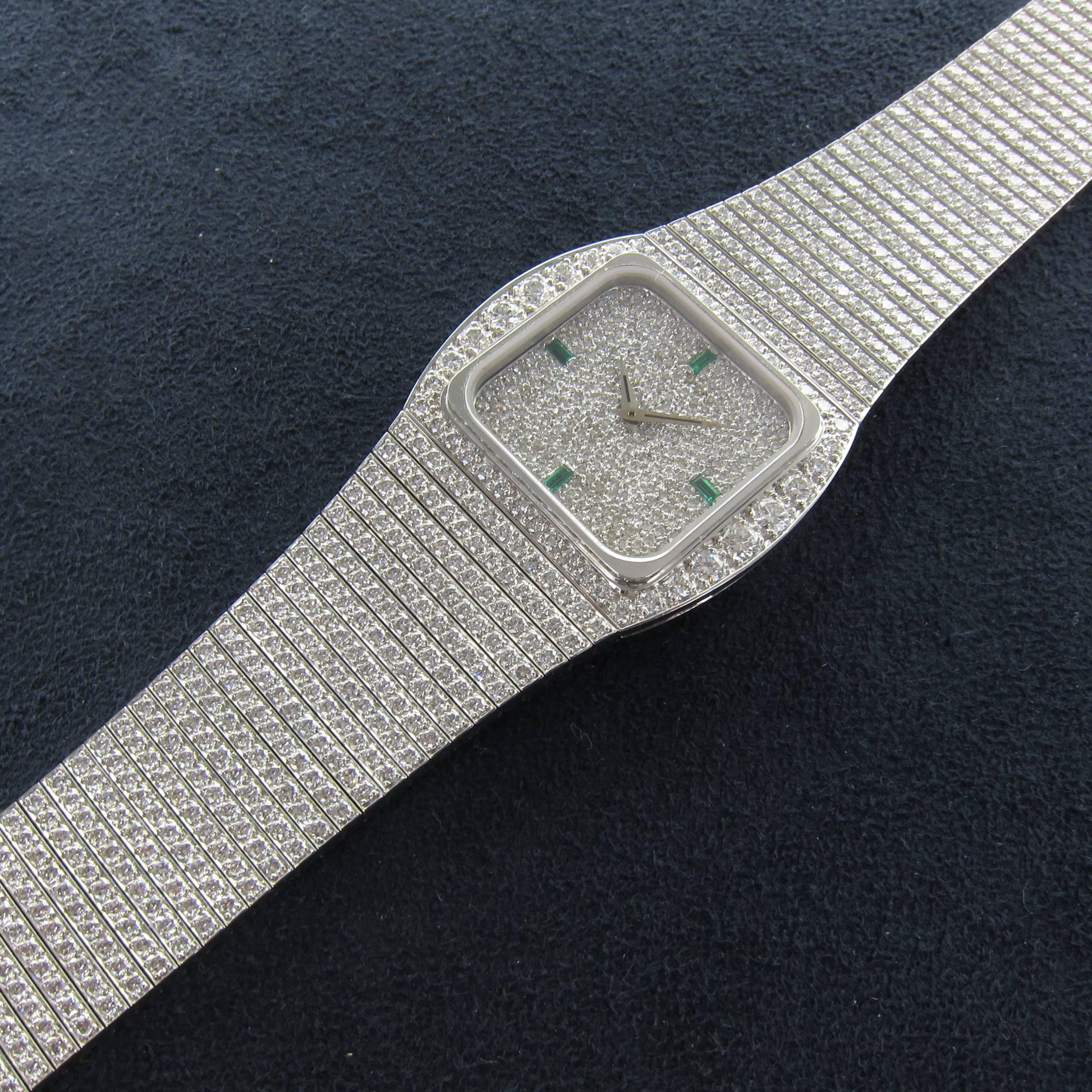 A Rare and Possibly Unique Patek Philippe Cushion-Shaped White Gold Diamond-Set Bracelet Watch with Emerald Markers and Dauphine Hands. 

Mechanical Movement

Reference 3636/1

29 X 34mm

Late 1970's