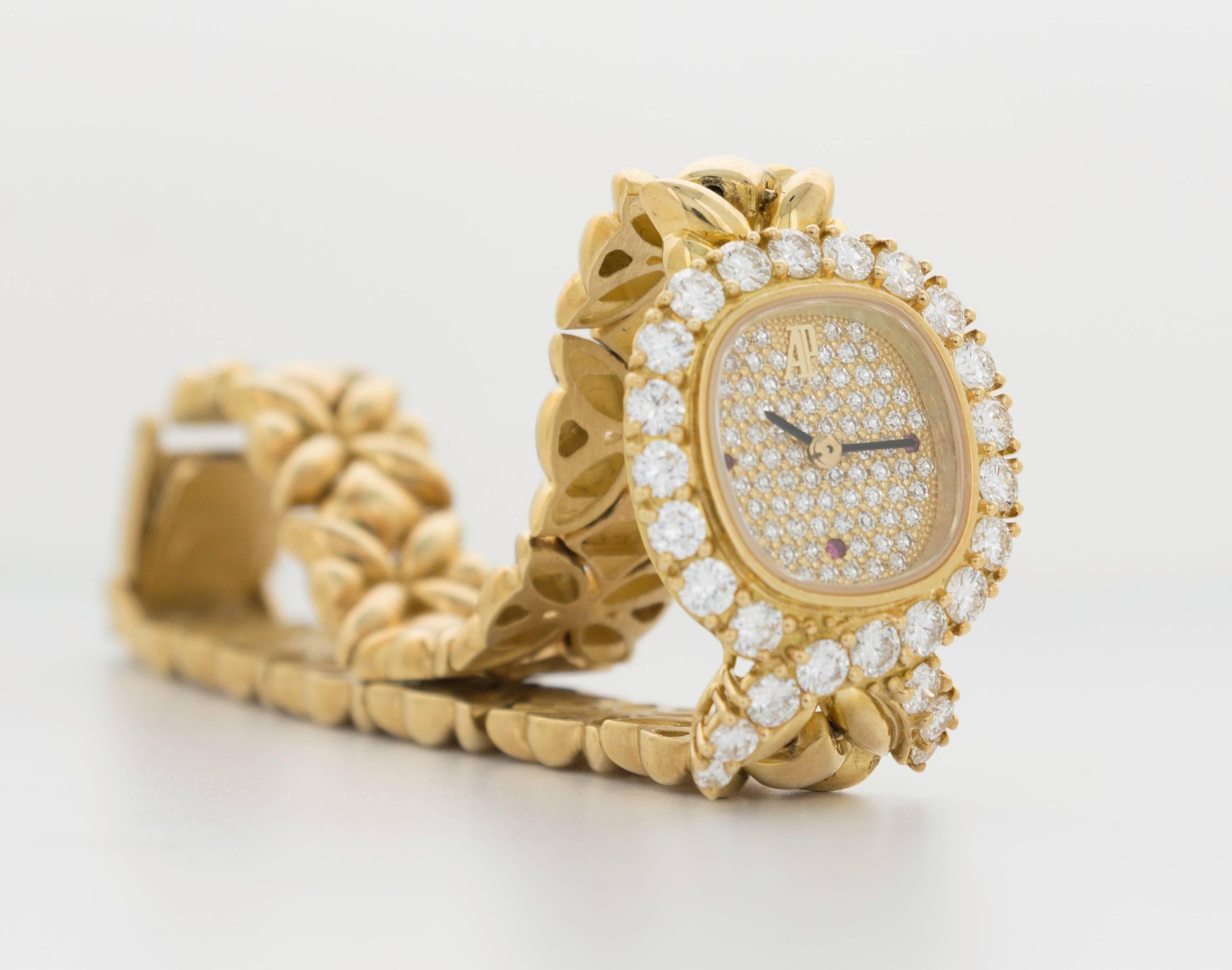 Modern Audemars Piguet Ladies Yellow Gold Diamond Ruby Bracelet Wristwatch